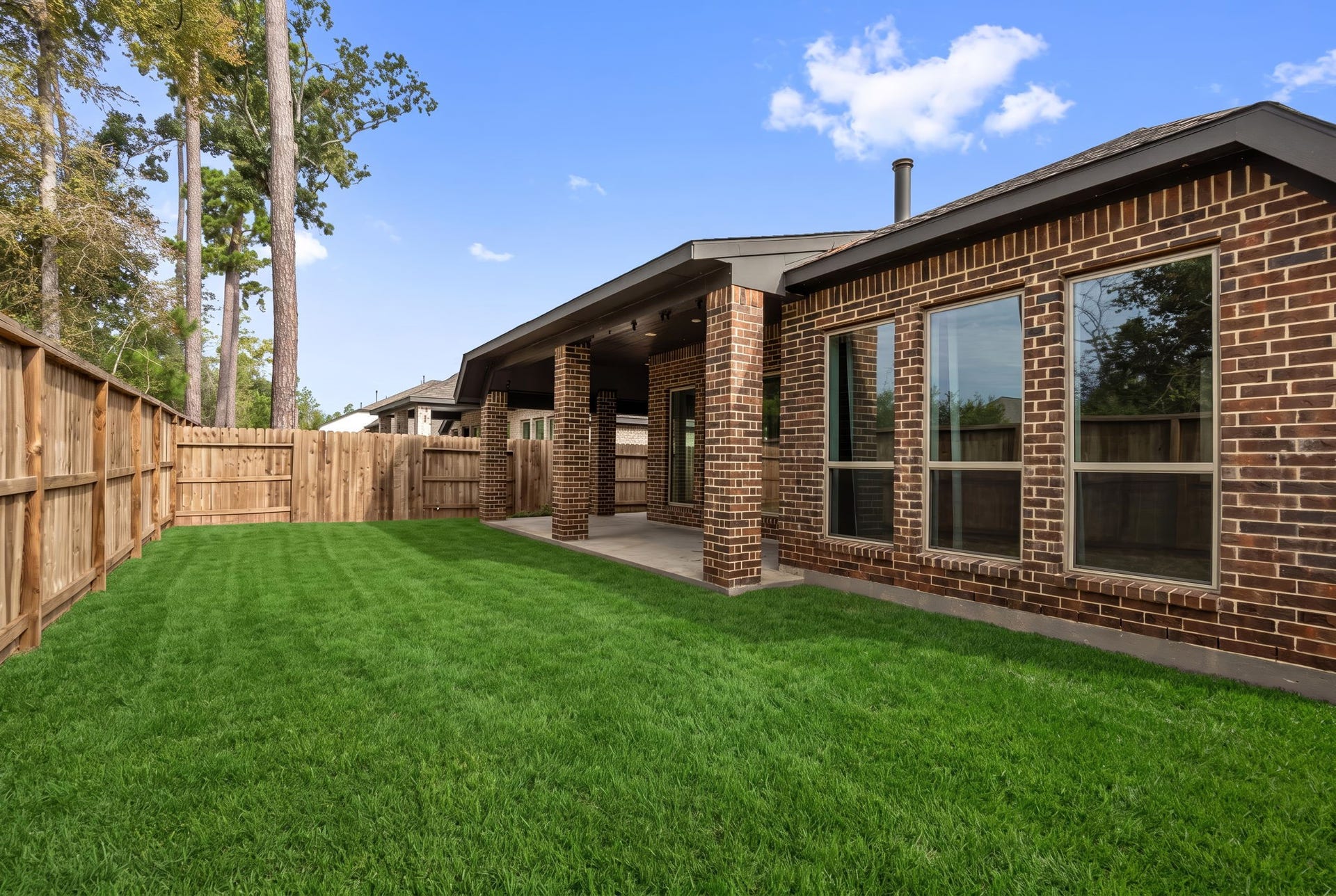 726 Fall Rock Branch Drive, Conroe, TX 77304 Generously sized backyard offers plenty of room for outdoor activities, gardening, or creating your ideal outdoor retreat.