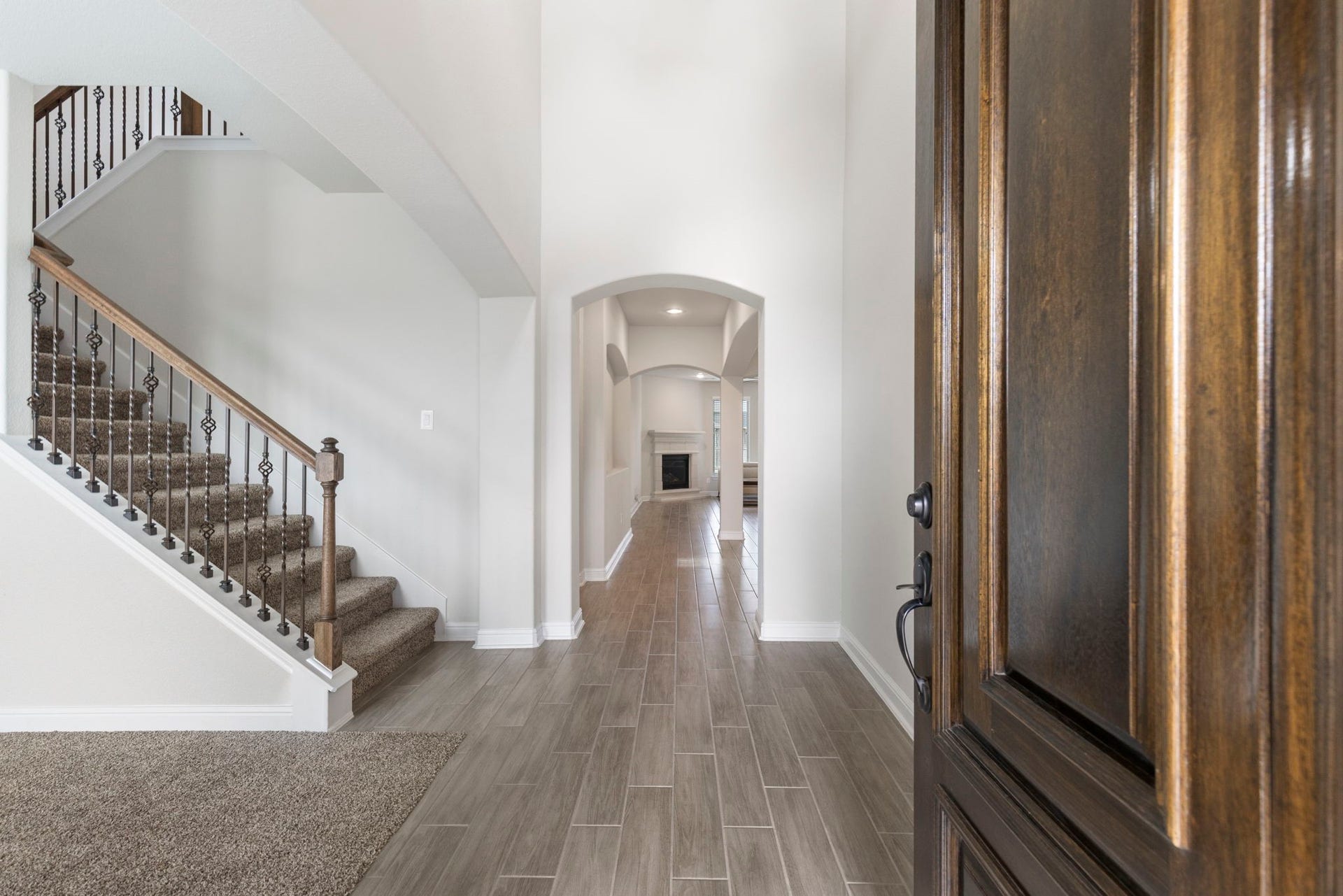 2819 Bradbury Hills Drive, Spring, TX 77373 Welcome to your dream home, where an inviting front door opens to a spacious foyer with elegant stairs, setting the stage for warmth and style.