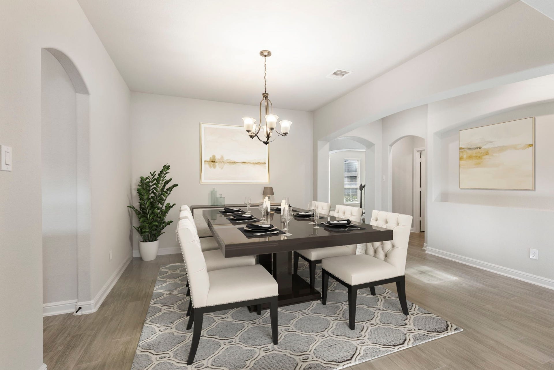 2819 Bradbury Hills Drive, Spring, TX 77373 Experience the elegance of this virtually staged dining room, featuring a sophisticated table setting, plush seating, and a stylish chandelier, all set in a bright, airy space perfect for entertaining.
