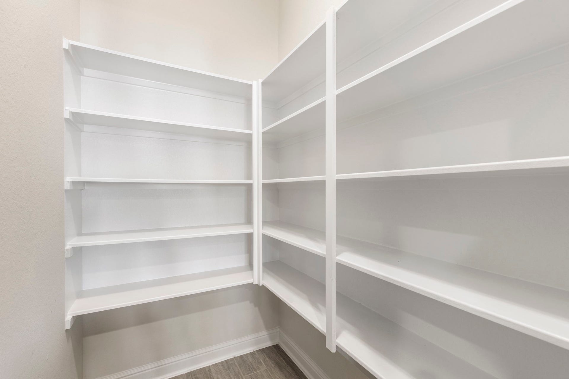 2819 Bradbury Hills Drive, Spring, TX 77373 Discover the perfect blend of style and functionality in this spacious walk-in pantry, offering sleek shelving and ample storage to keep your kitchen essentials organized and within reach.