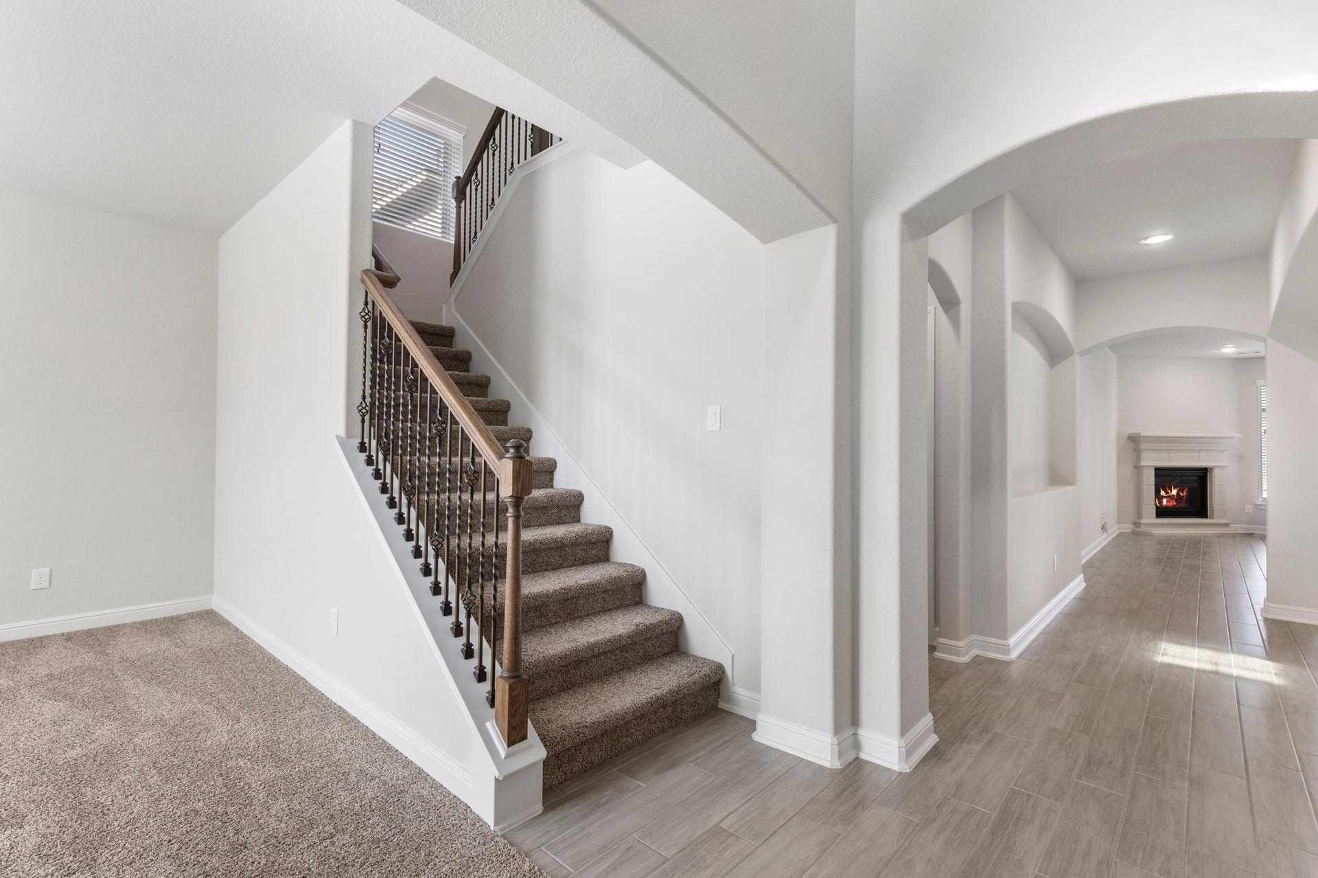 2819 Bradbury Hills Drive, Spring, TX 77373 As you enter, a charming staircase invites you to explore the second floor, promising more of this home's elegance and warmth.