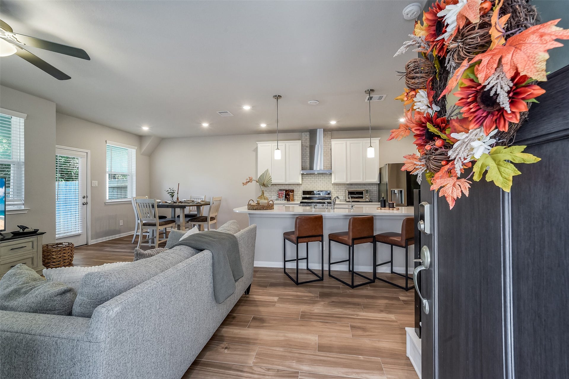 Step into an inviting main living area where the living room, kitchen, and dining space connect, keeping everyday life and conversation together.