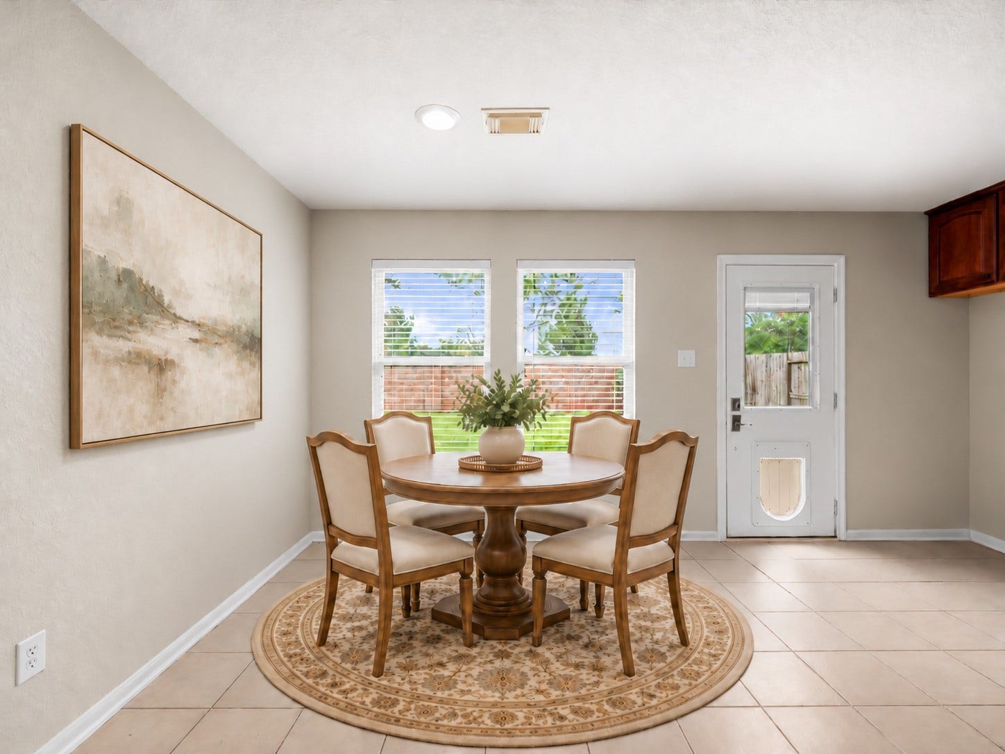 20118 Monarda Manor Court, Spring, TX 77379 Furnishings have been virtually added to showcase the possibilities of this open-concept living area, where soaring ceilings, abundant natural light, and a cozy fireplace create a welcoming gathering space.