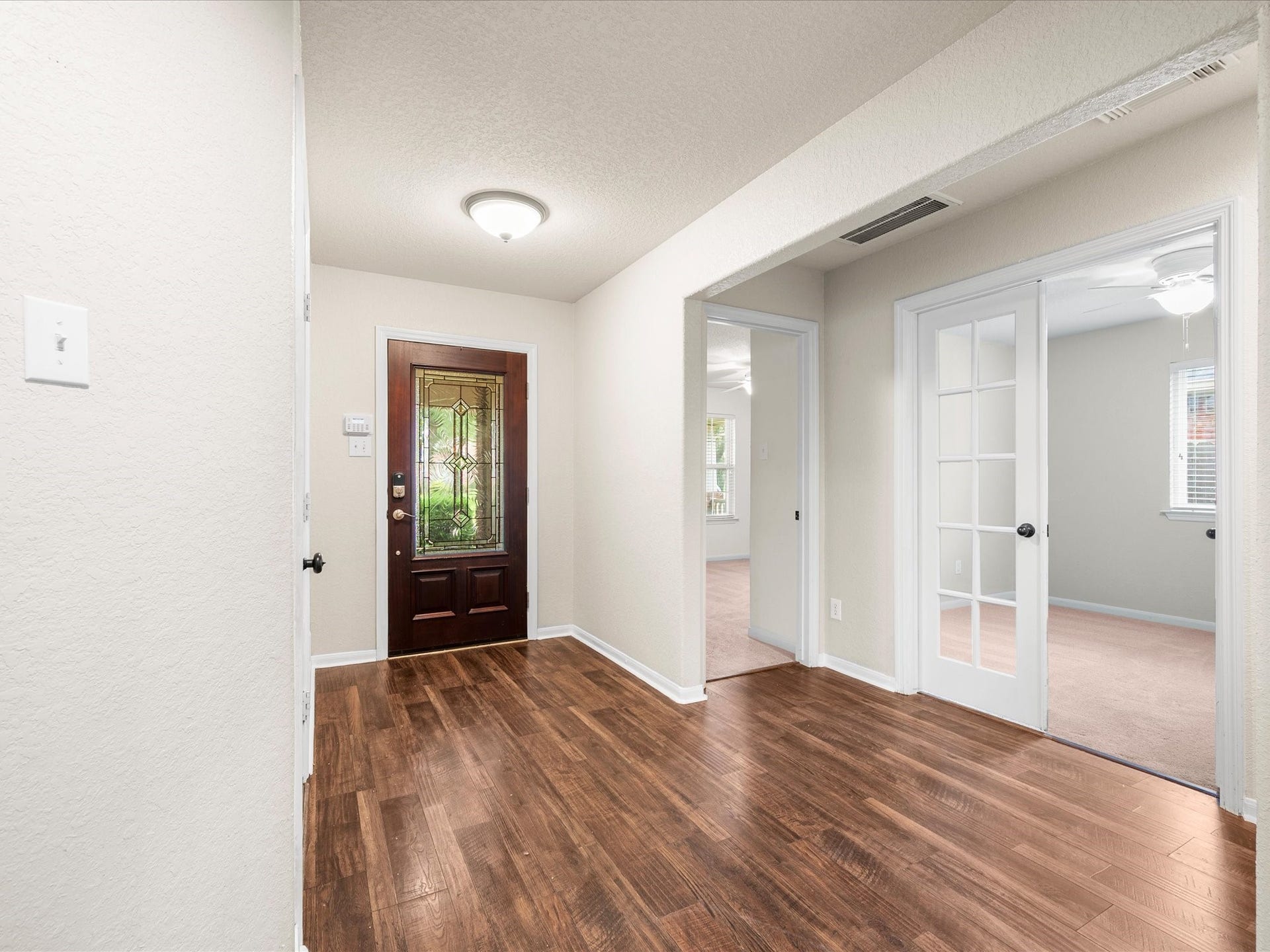 20118 Monarda Manor Court, Spring, TX 77379 Beautiful vinyl plank flooring extends throughout the main living areas, offering durability, easy maintenance, and a timeless look.
