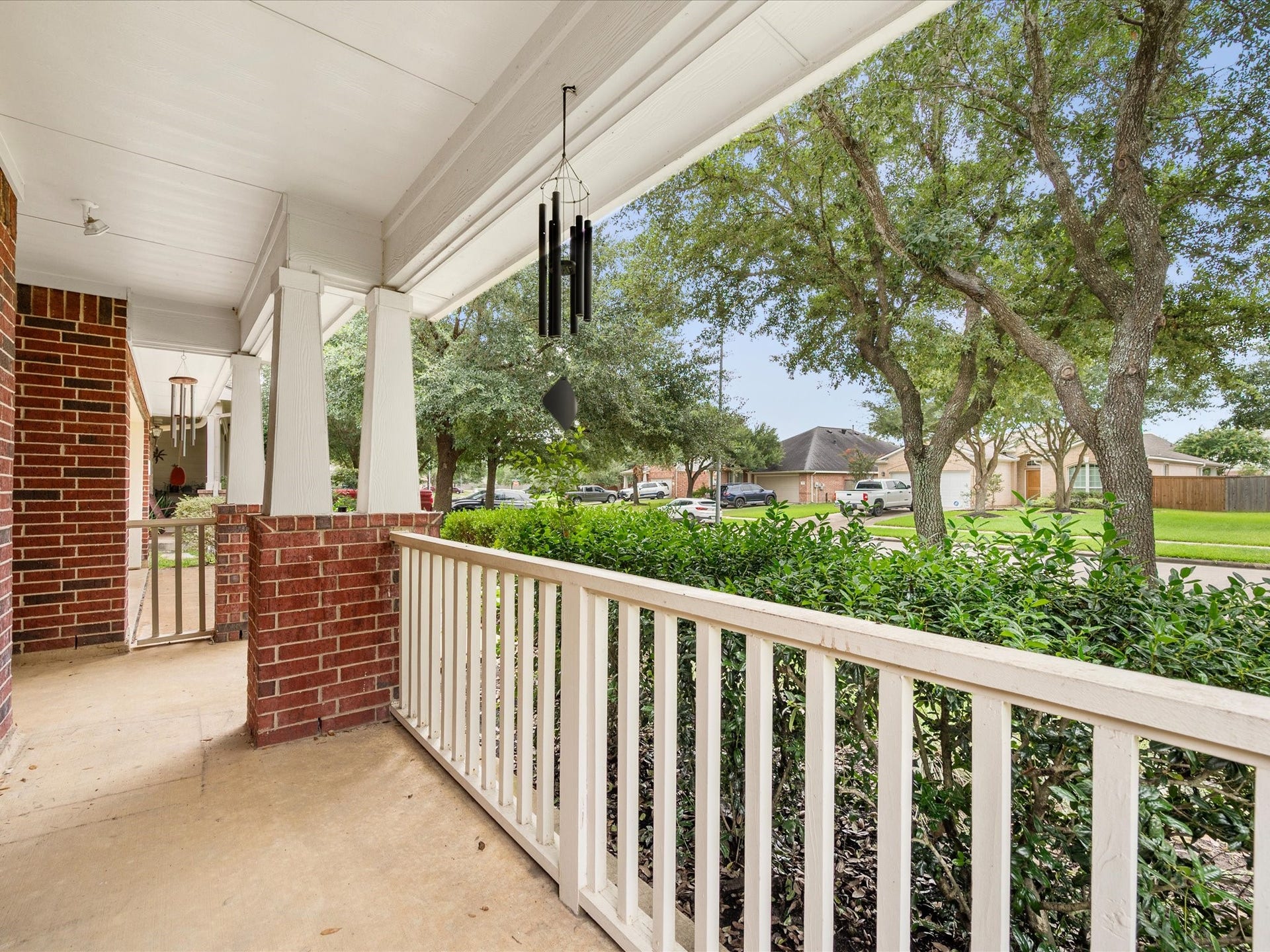 20118 Monarda Manor Court, Spring, TX 77379 A welcoming front porch creates the perfect spot to enjoy morning coffee or unwind while taking in the beautifully established neighborhood surroundings.