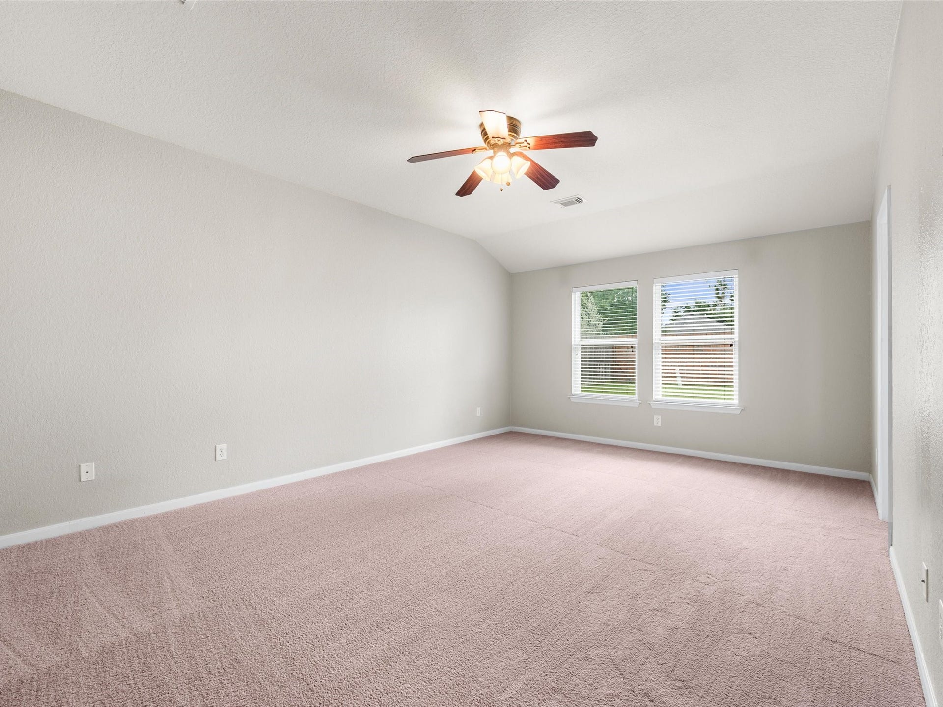 20118 Monarda Manor Court, Spring, TX 77379 The spacious primary suite offers a peaceful retreat with room to relax and unwind at the end of the day.