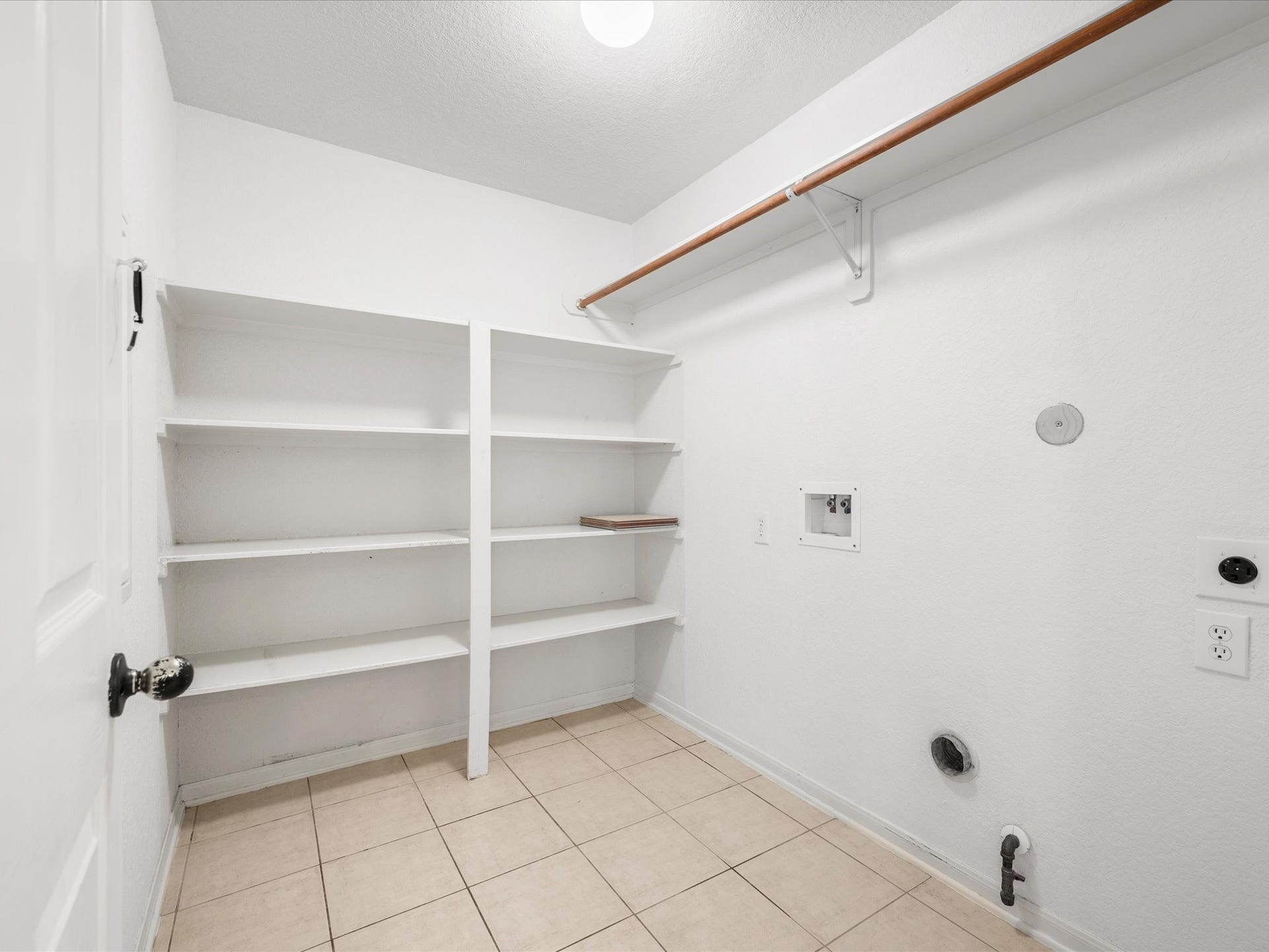 20118 Monarda Manor Court, Spring, TX 77379 The spacious laundry space provides convenience and functionality for everyday household needs.