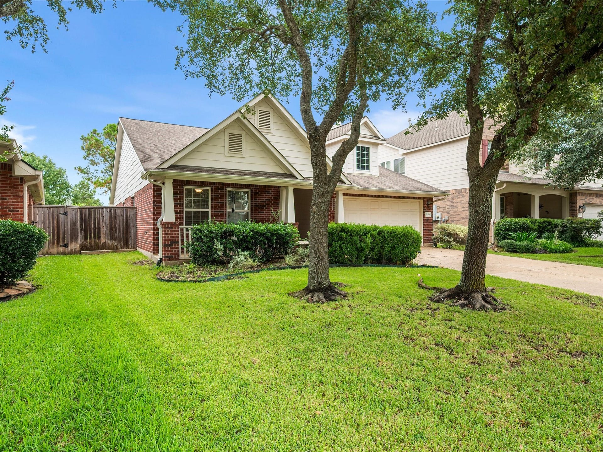 20118 Monarda Manor Court, Spring, TX 77379 The inviting front porch creates a warm first impression with a welcoming view of the front entry and a comfortable space to enjoy the outdoors.