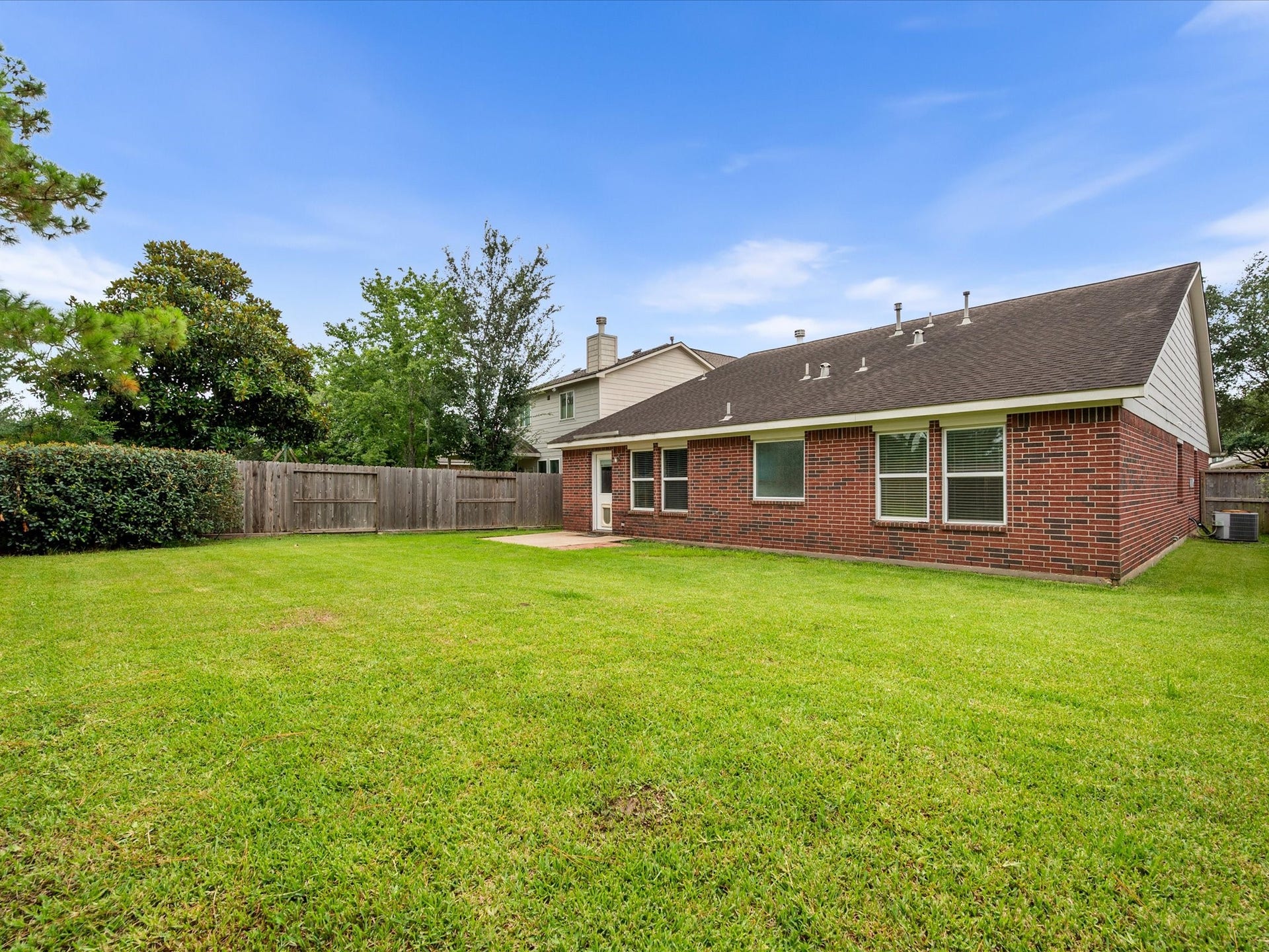 20118 Monarda Manor Court, Spring, TX 77379 The backyard provides a peaceful extension of the living space with room to relax and enjoy the outdoors.