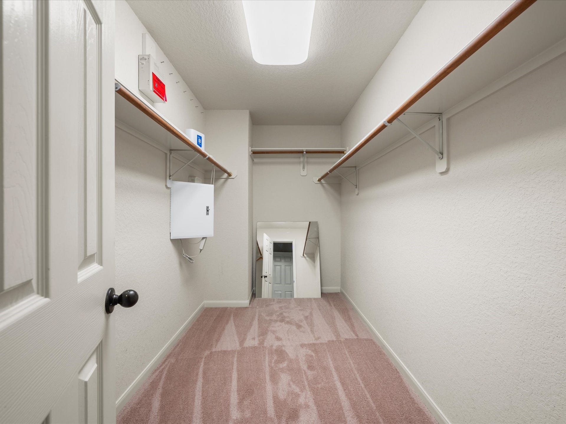 20118 Monarda Manor Court, Spring, TX 77379 The expansive primary walk-in closet provides excellent storage space and room to keep everything organized with ease.