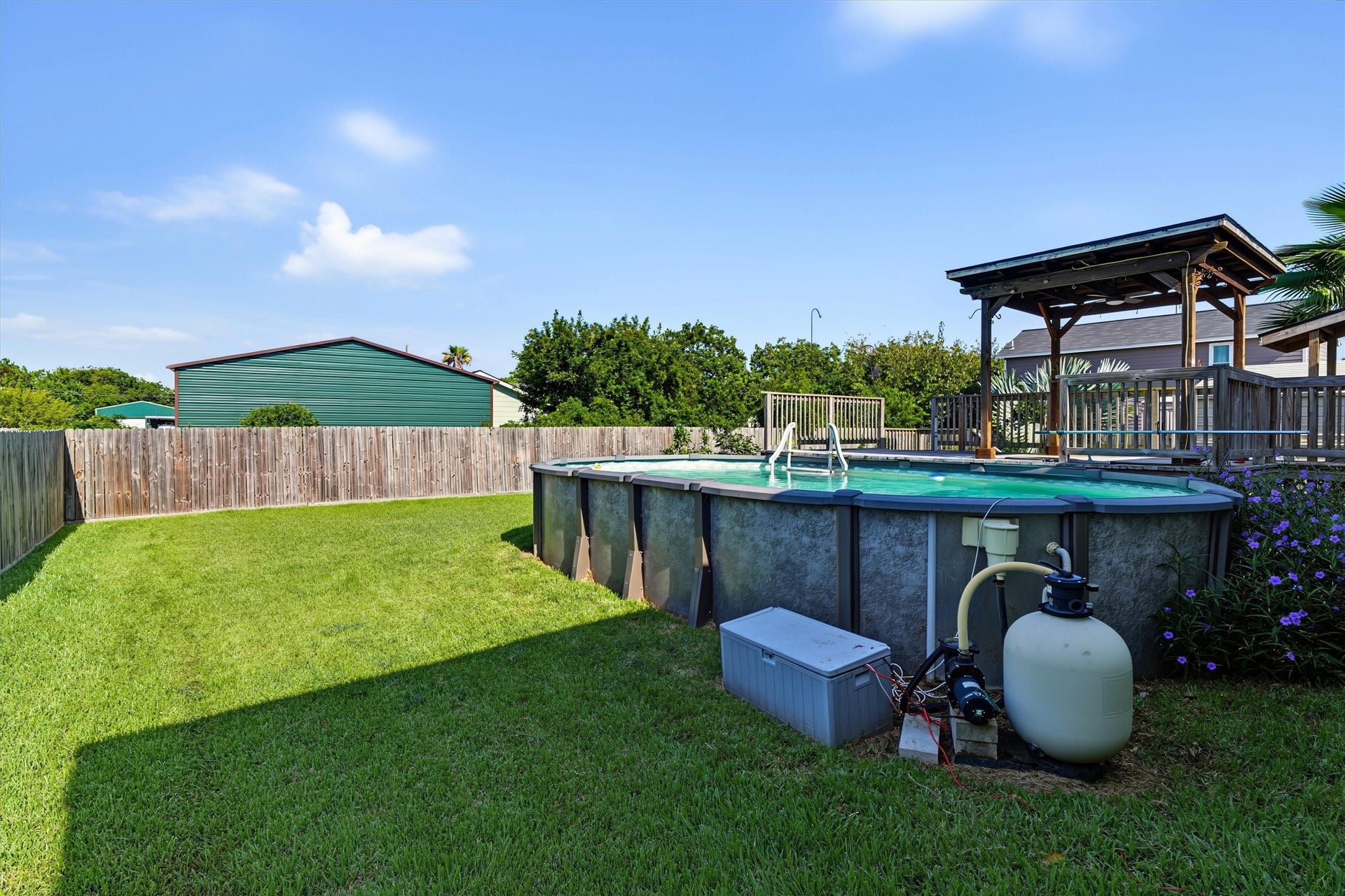546 5th Street, Dickinson, TX 77539 Oversized Above-Ground Pool A fantastic backyard feature offering plenty of room to cool off, relax, and create unforgettable summer memories with family and friends