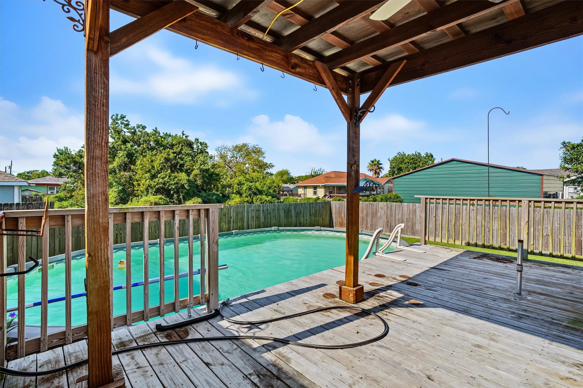 546 5th Street, Dickinson, TX 77539 Shaded Poolside Retreat Relax in the shade while keeping an eye on the kids as they splash and play in the pool. The perfect spot for parents to unwind while the fun continues!
