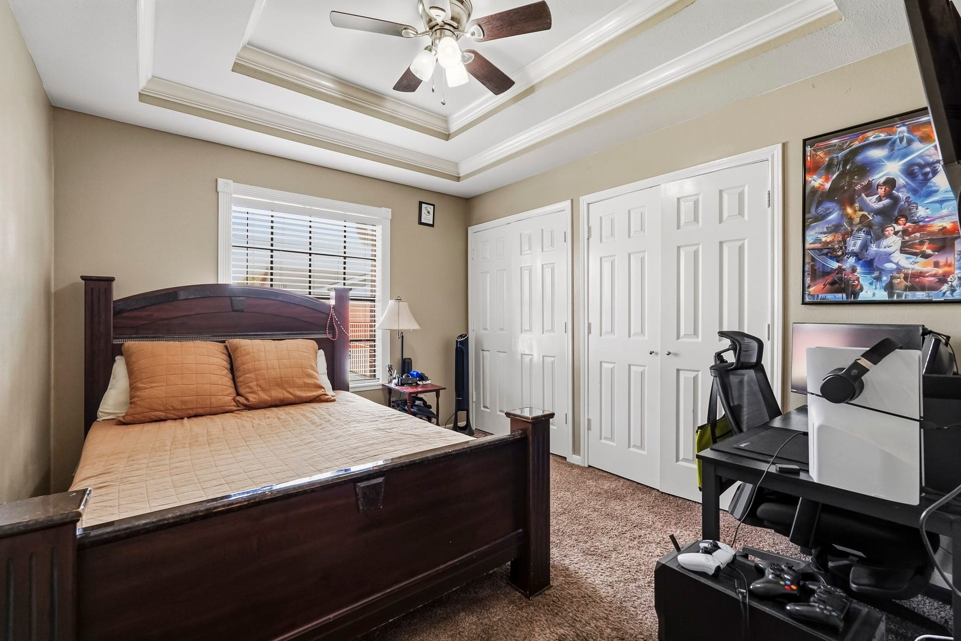 1207 9th Street, Galena Park, TX 77547 Cozy fourth bedroom with a tray ceiling and fan.