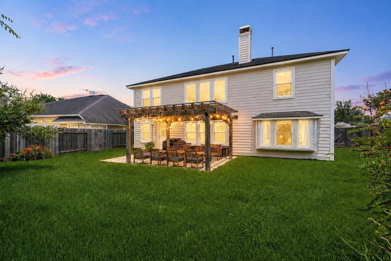 3915 Eastland Lake Drive, Richmond, TX 77406 The backyard offers ample open space for enjoying the fresh air, playing, or entertaining, all kept effortlessly green and vibrant by a full sprinkler system.
