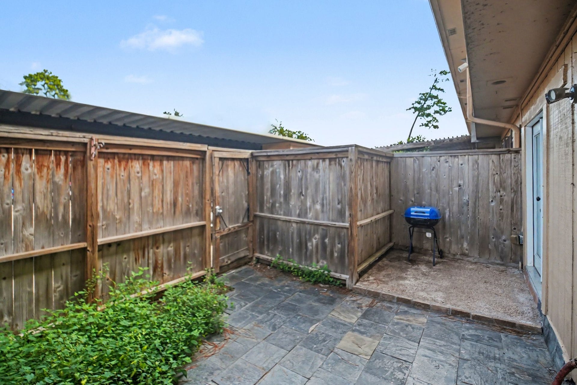 Experience serene outdoor living in your own private patio oasis, perfect for relaxing or entertaining.