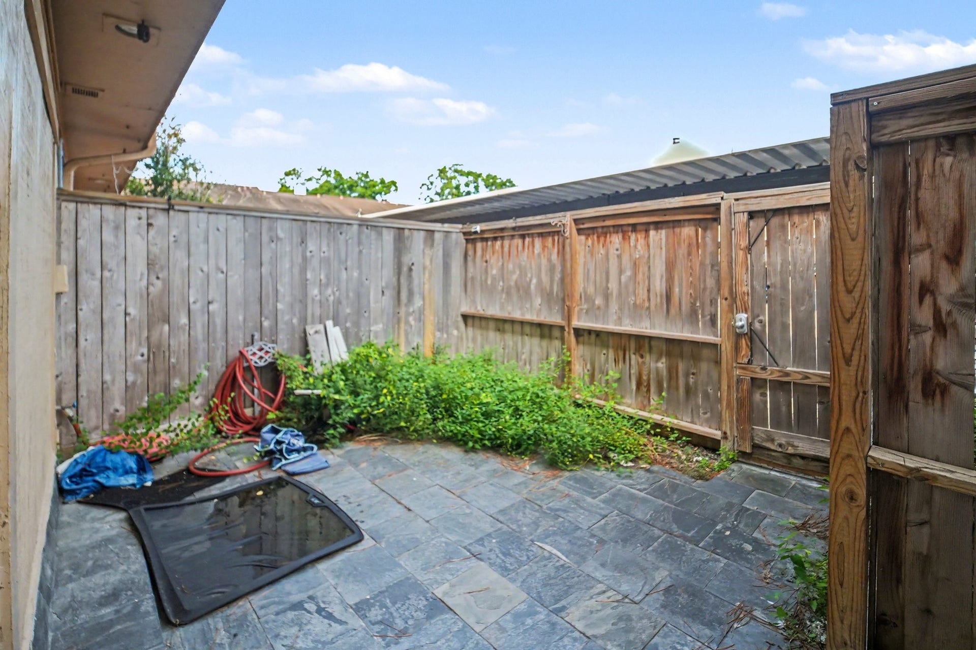 Enjoy your own serene retreat with this private patio, perfect for relaxation and outdoor gatherings.