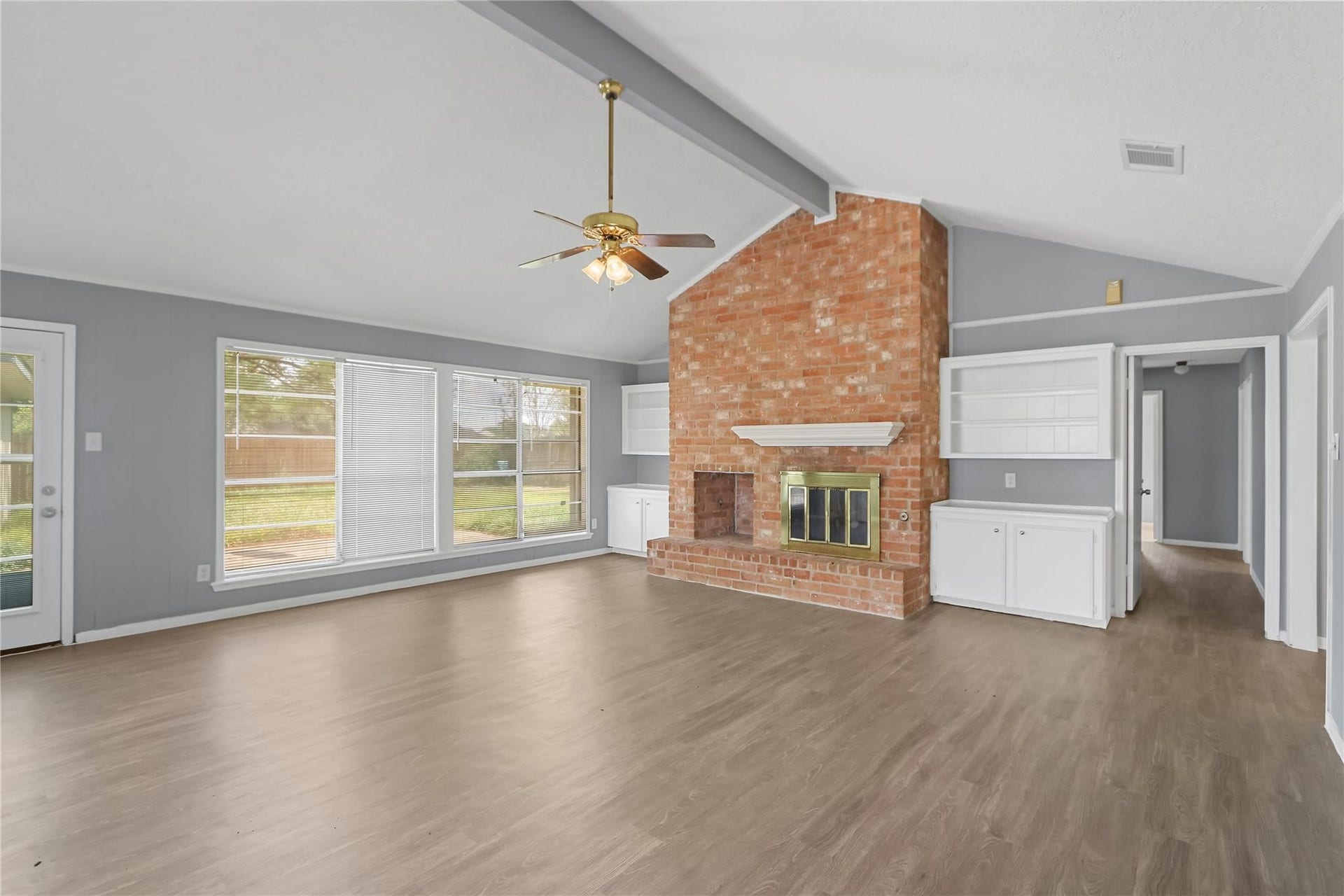 Corner view of the living room. Easy access to the backyard.