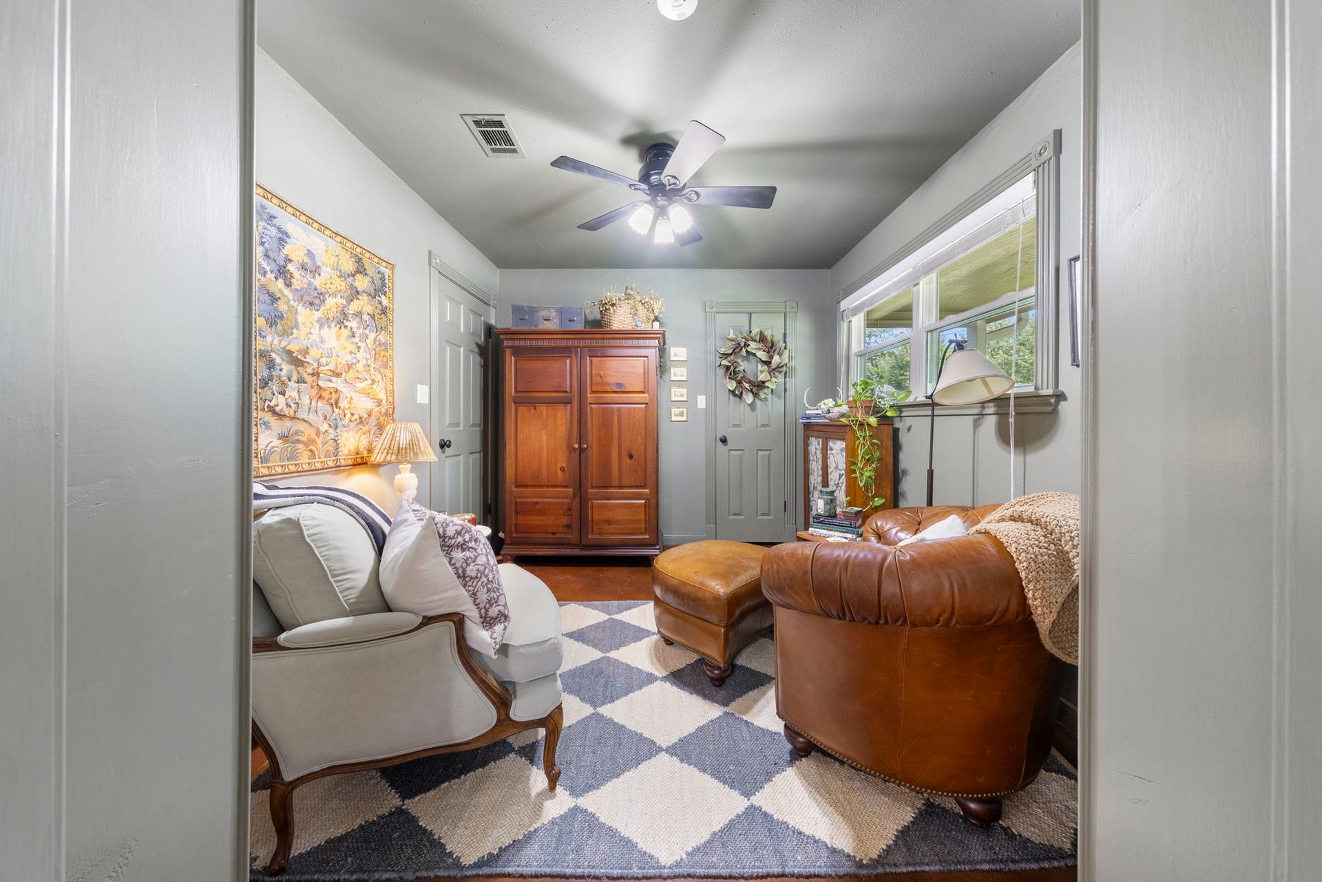 This private study offers a quiet and versatile retreat with abundant natural light, making it ideal for a home office, reading room, or creative workspace.