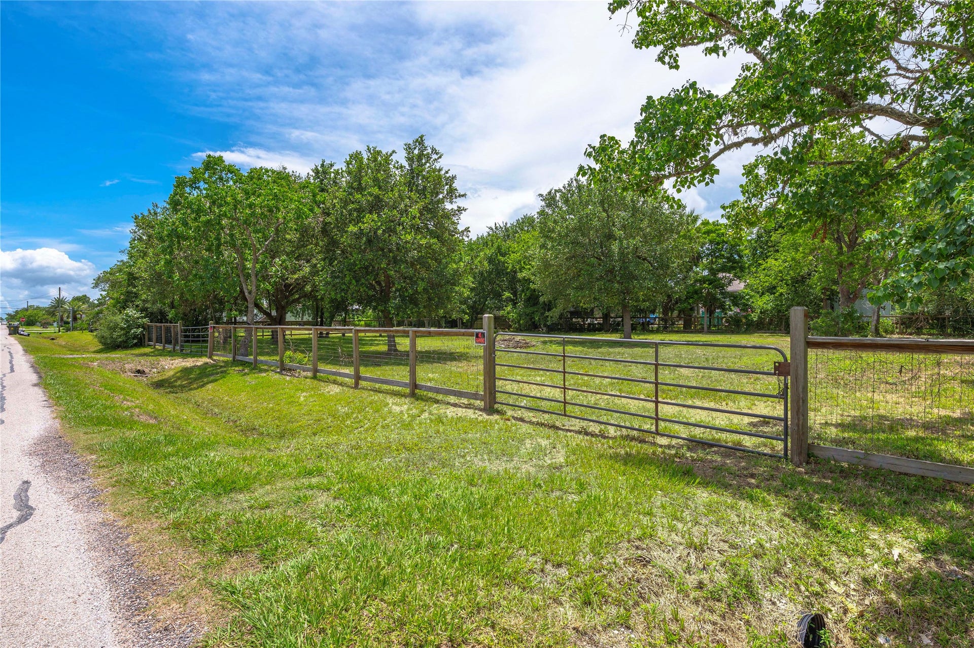 410 7th Street, San Leon, TX 77539 Gated access, culvert entrances & perimeter fencing.