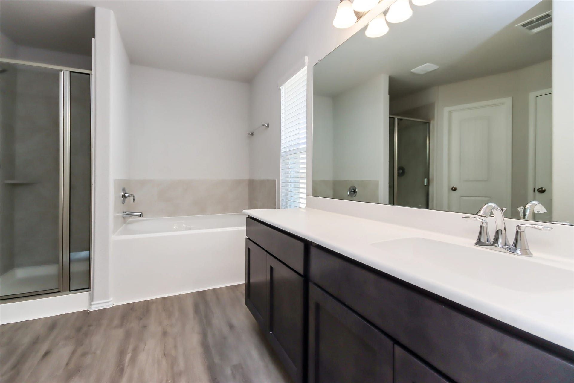21602 Lexor Drive, Porter, TX 77365 Photos may be representative of the floor plan and not the exact home. Finishes, layout, and features of the actual property for lease may vary.