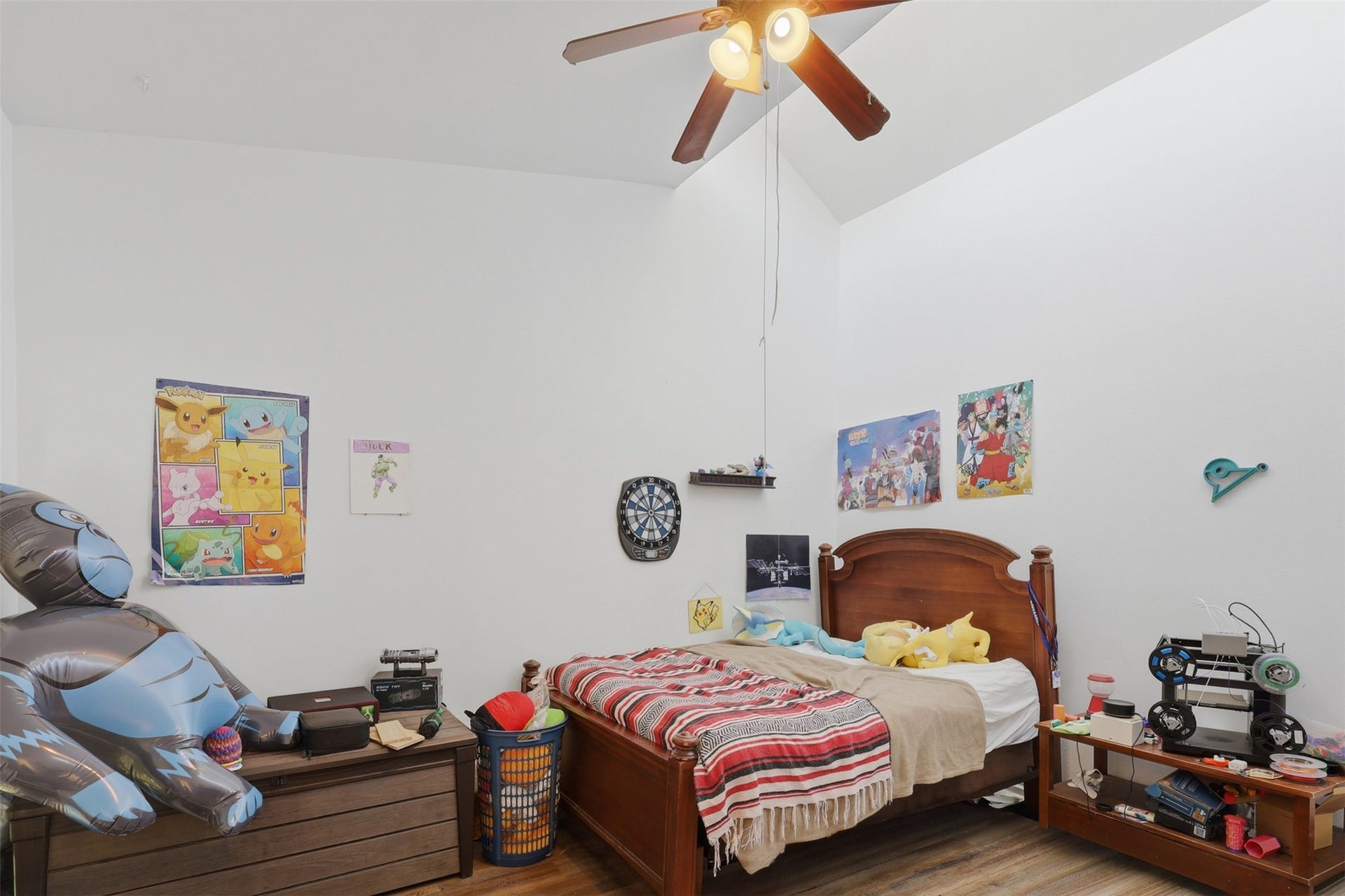 High architectural peaks give this comfortable secondary bedroom an open, roomy feel with plenty of space to spread out.