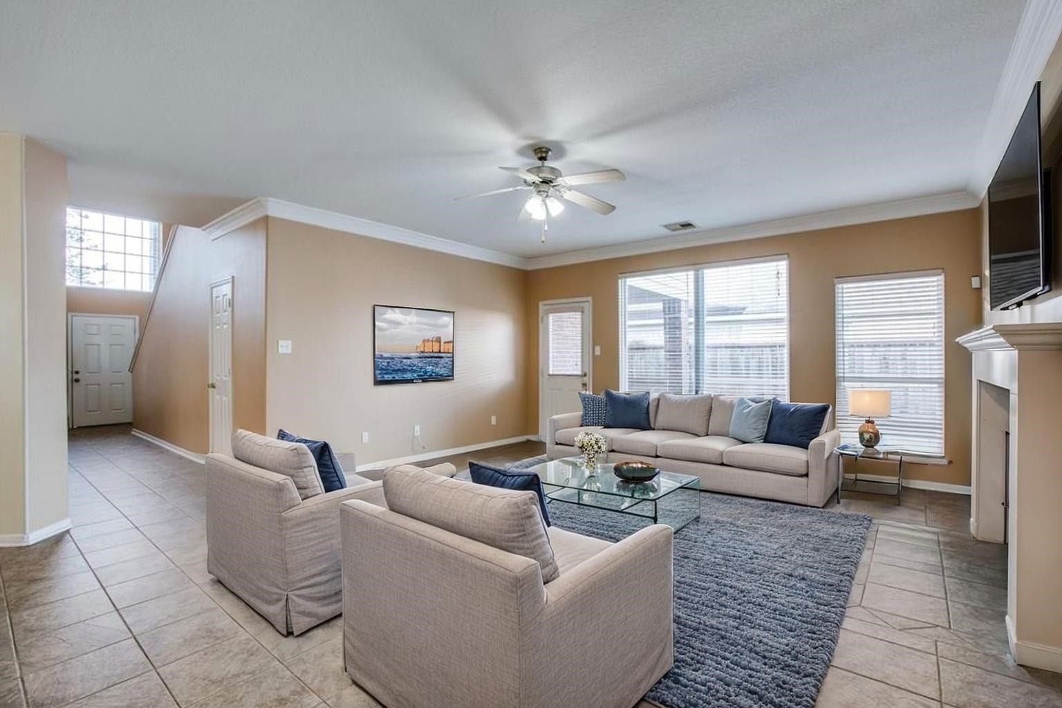 9907 Valance Way, Conroe, TX 77385 Digitally staged living room