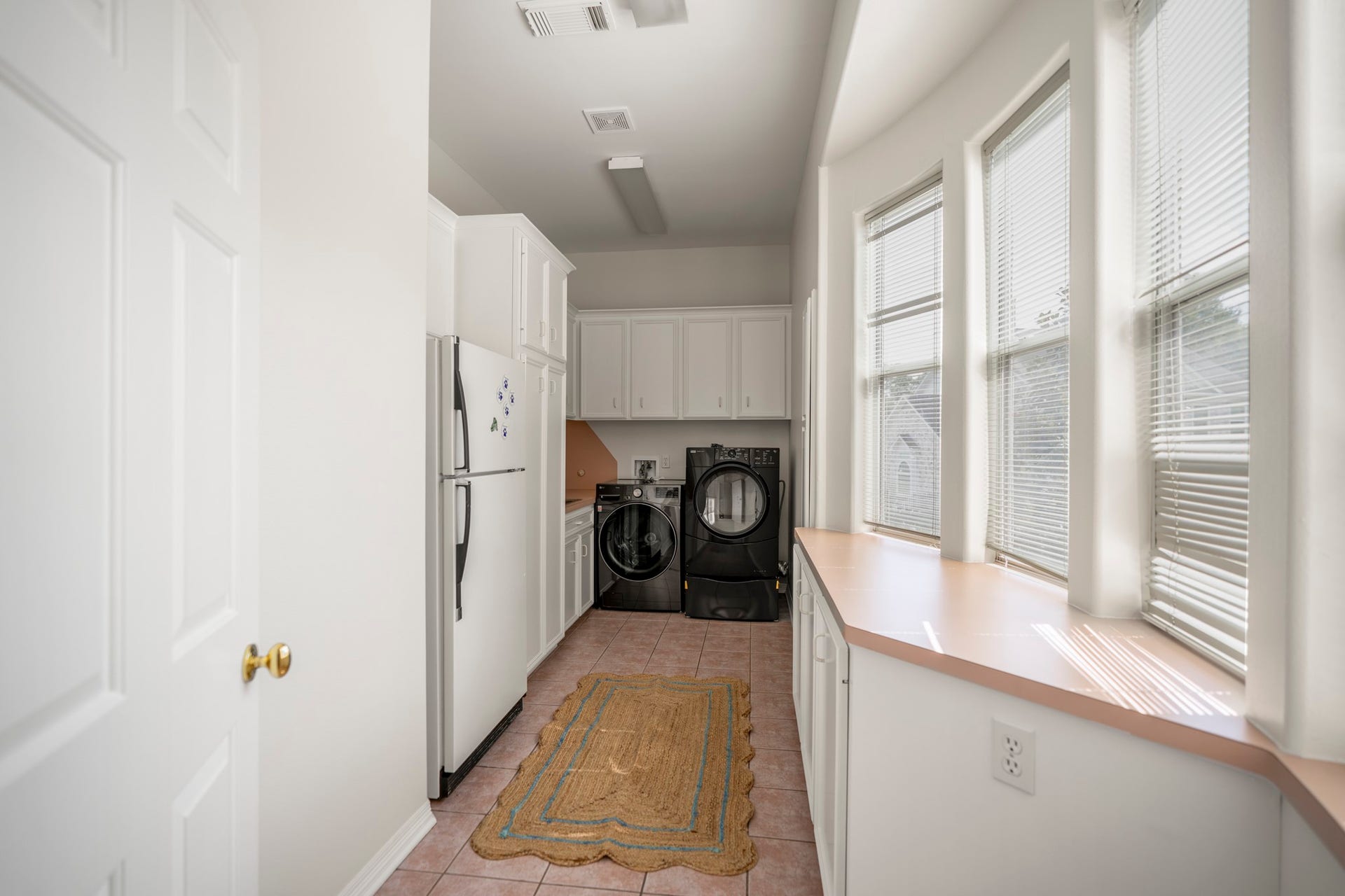 863 Plainwood Drive, Houston, TX 77079 The laundry room is located just off the second floor living room.