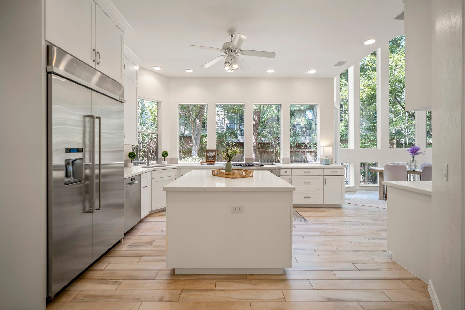 863 Plainwood Drive, Houston, TX 77079 An open layout connects the kitchen naturally to the dining and living spaces.