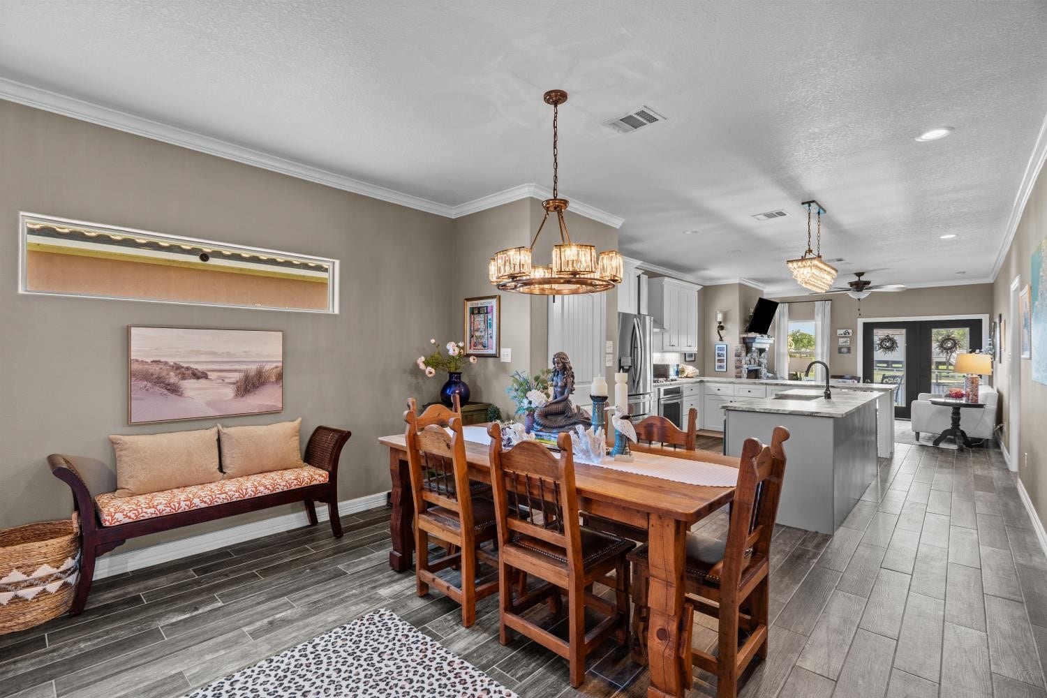 639 29th Street, San Leon, TX 77539 Wood like tile floors throughout the home, neutral paint colors, and upgraded, stylish light fixtures you are sure to love