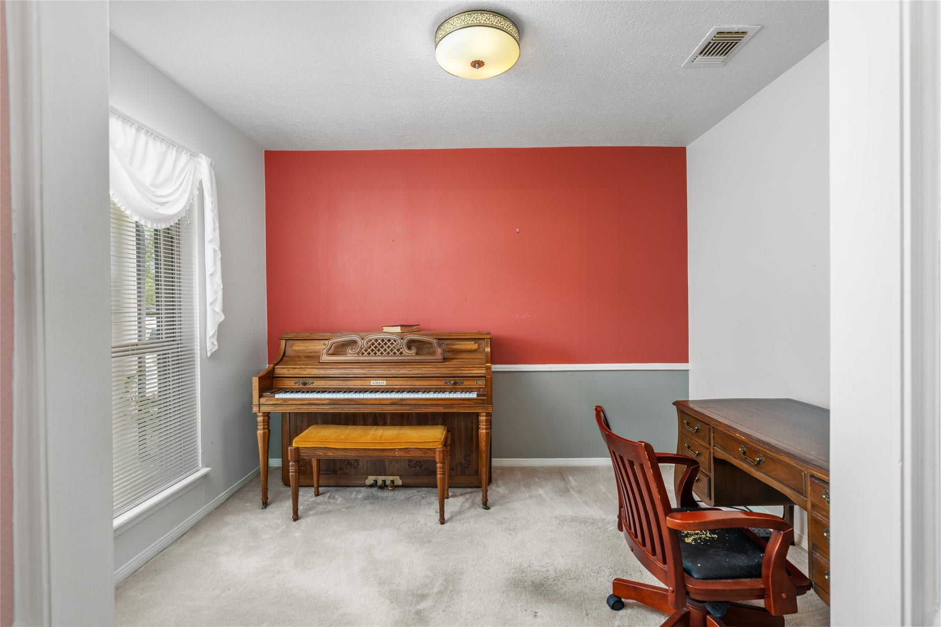 7015 Rosebrook Circle, Spring, TX 77379 Dedicated home study, perfect for a quiet private office, library, or creative music space.