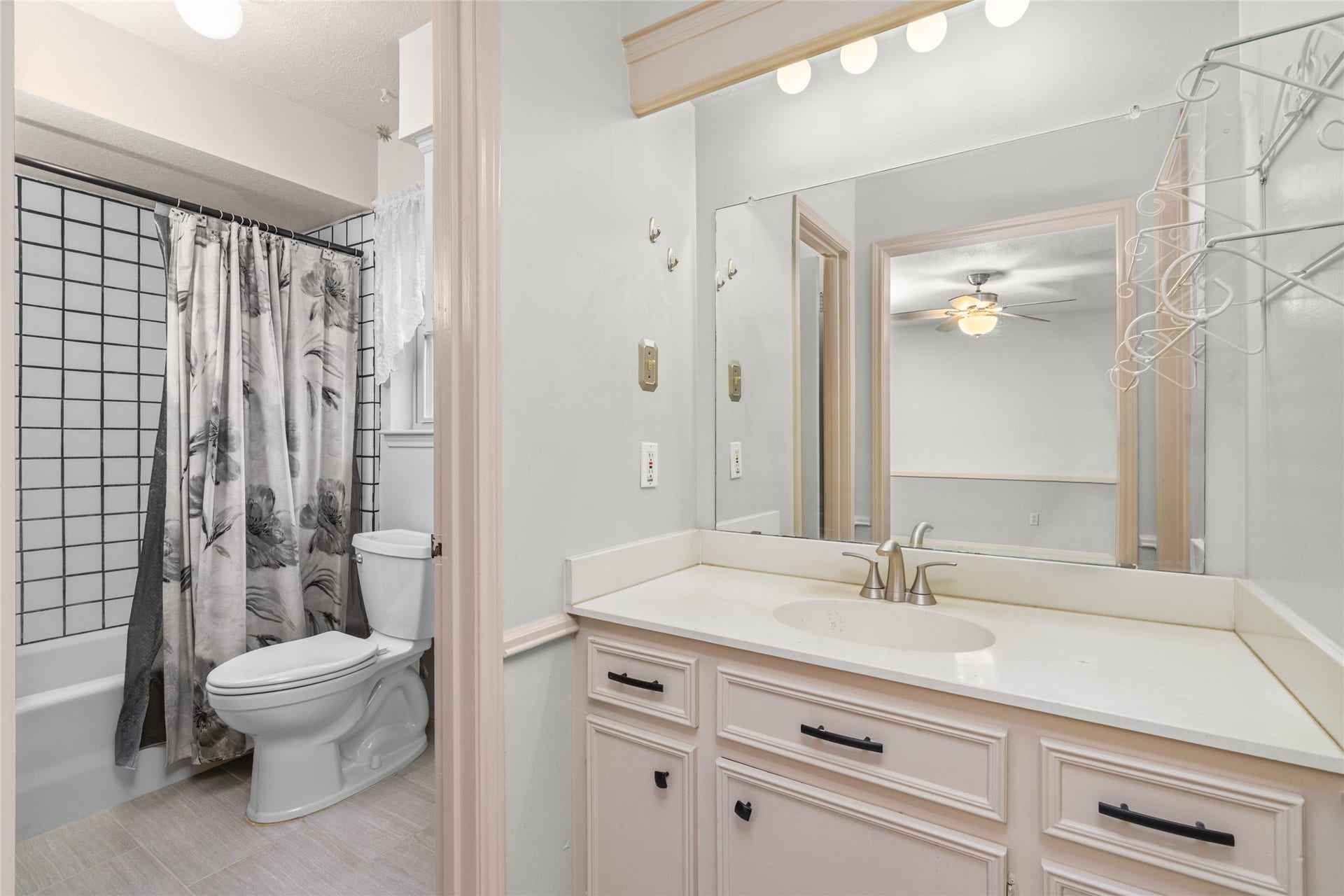 7015 Rosebrook Circle, Spring, TX 77379 En-suite primary bath convenience features an expansive vanity counter and two private master closets.