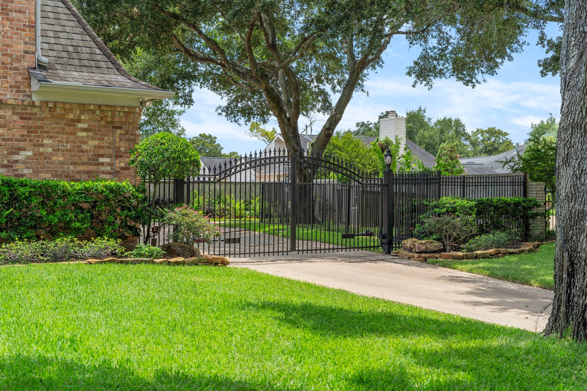 The gated driveway to the motor-court enhances privacy and security.