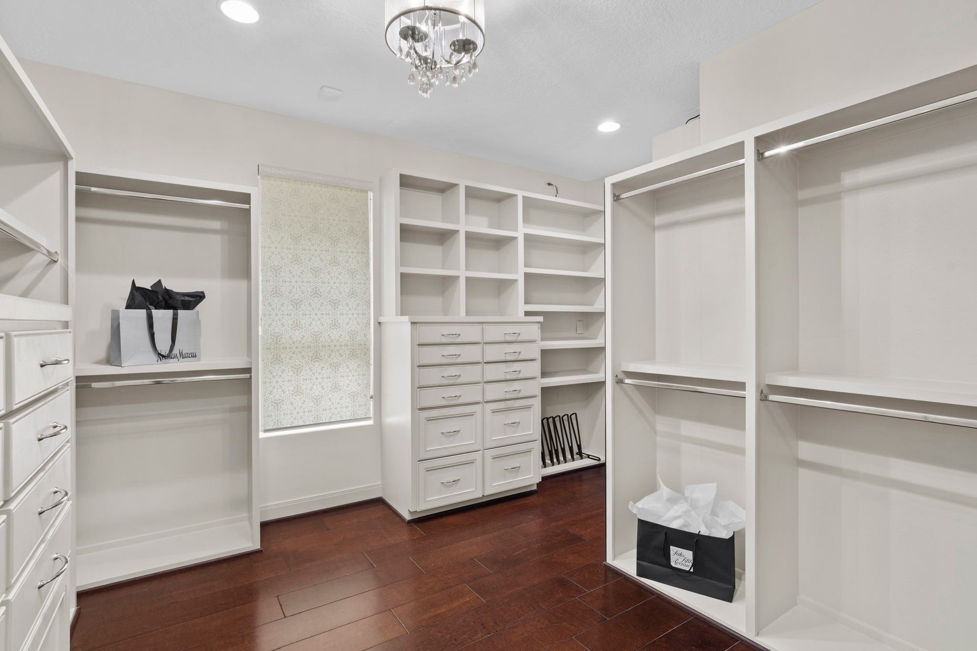 The oversized dressing room is a showstopper with meticulously designed storage solutions.