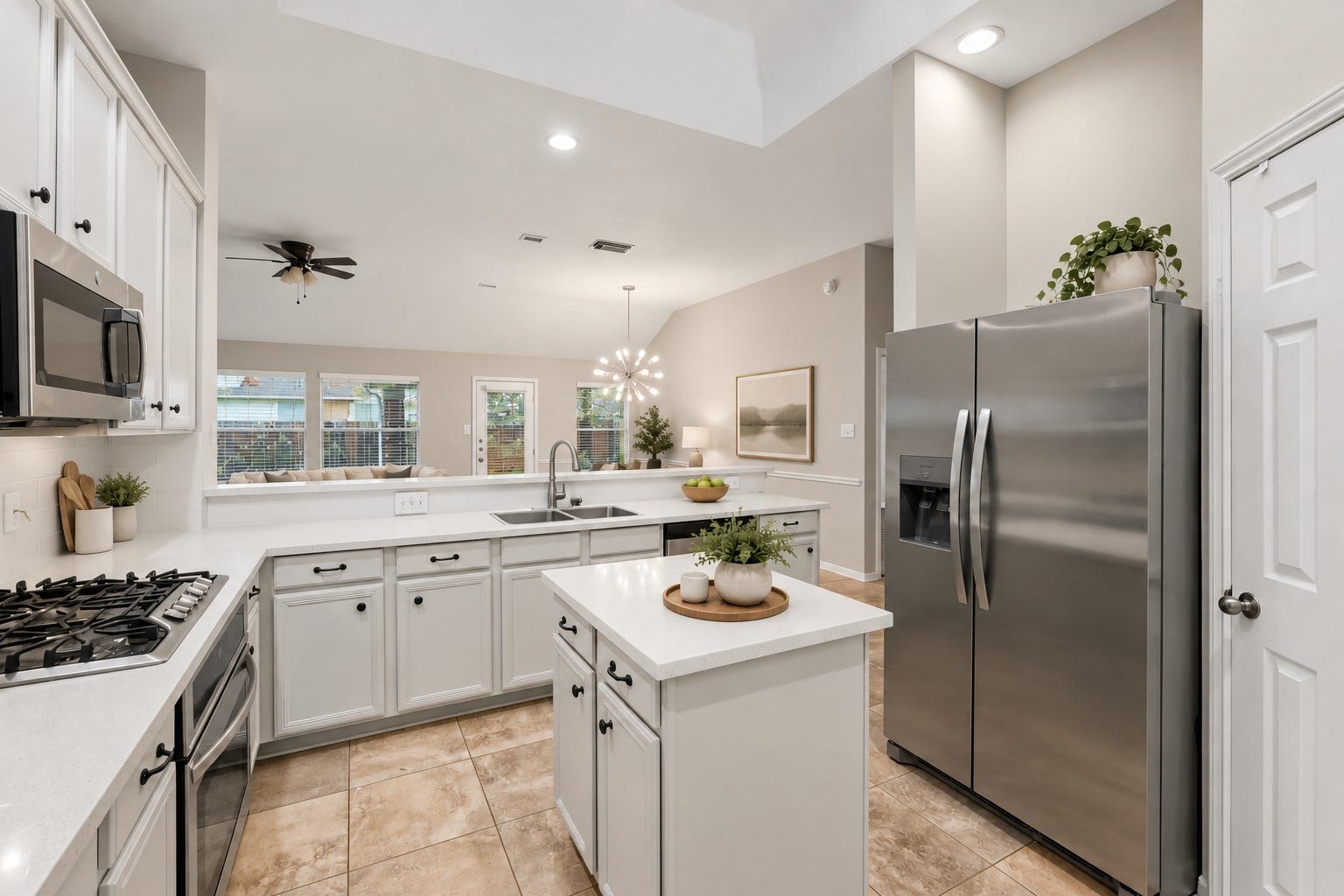 14319 Floret Estates Court, Cypress, TX 77429 At the heart of the home, the chefs island kitchen boasts 42" cabinetry with crown molding, stainless steel appliances and expansive countertops