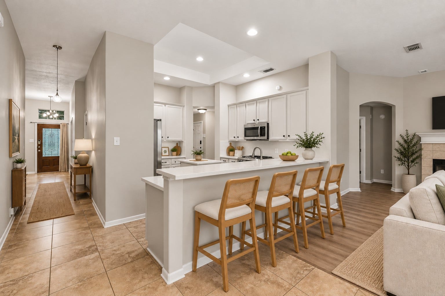 14319 Floret Estates Court, Cypress, TX 77429 At the heart of the home, the chefs island kitchen boasts 42" cabinetry with crown molding, stainless steel appliances and expansive countertops