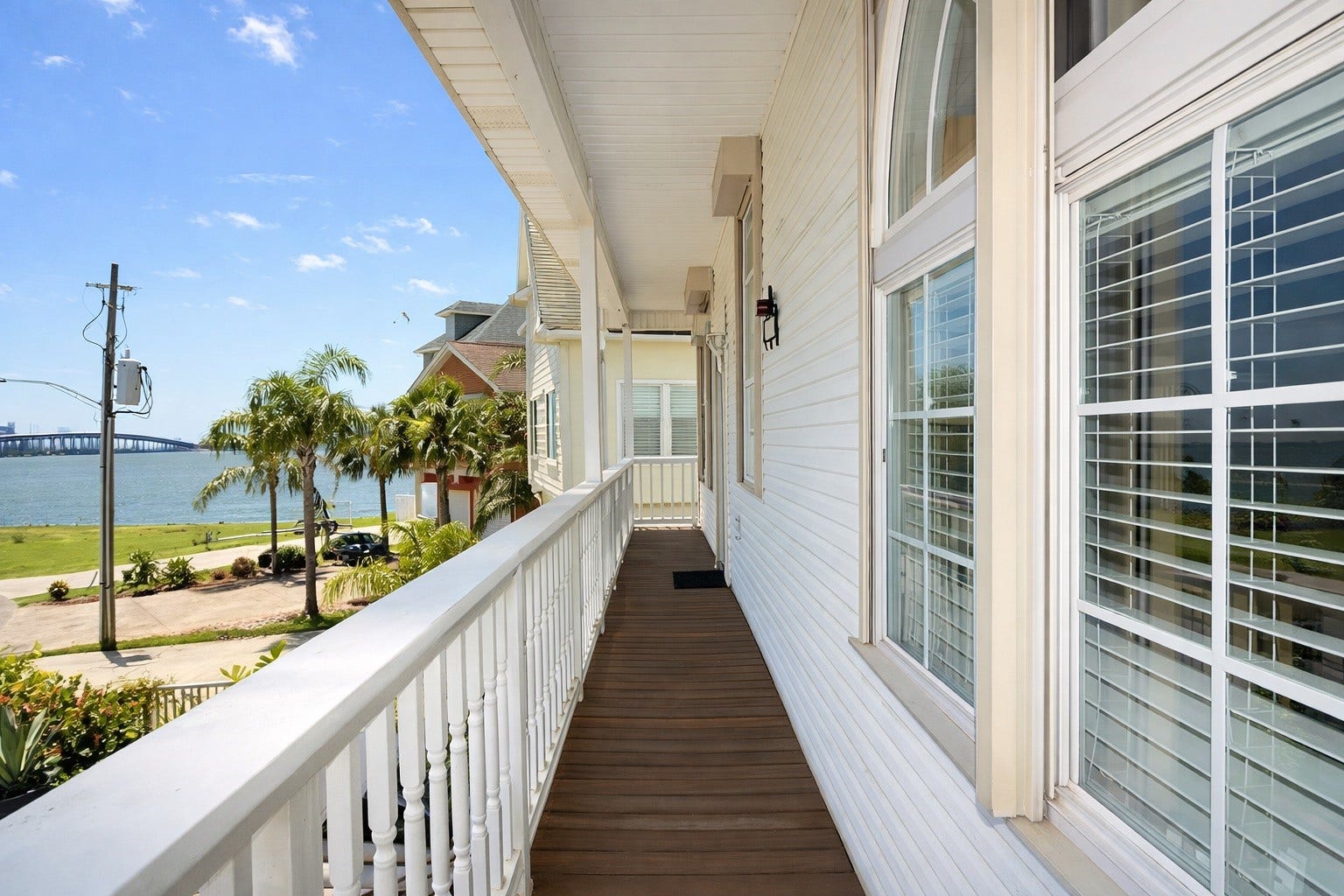 431 Hana Drive, Tiki Island, TX 77554 Covered balcony with water views