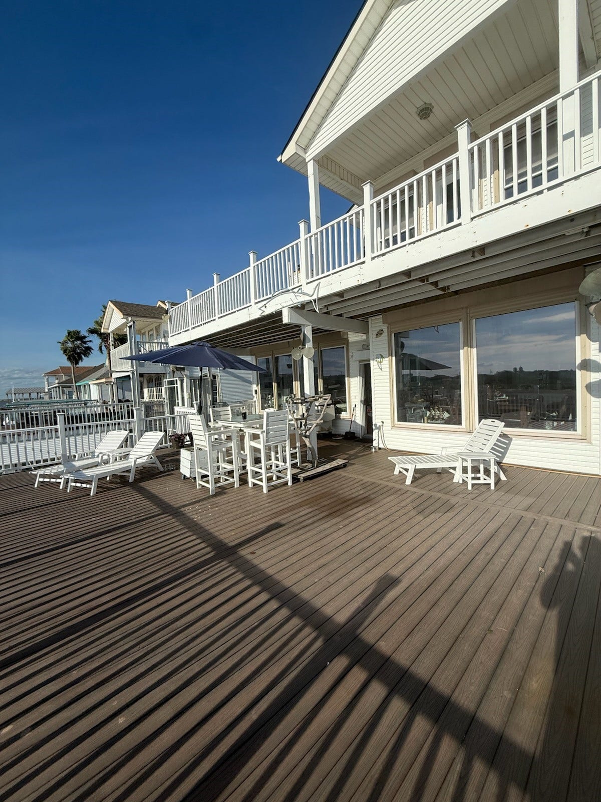 431 Hana Drive, Tiki Island, TX 77554 Waterside deck and rear exterior