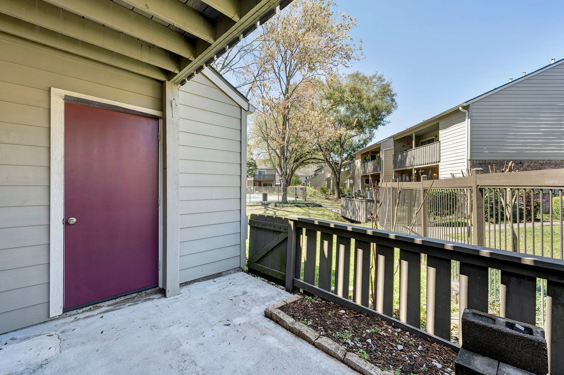 5005 Georgi Lane, #165, Houston, TX 77092 Patio off the living room with storage closet.