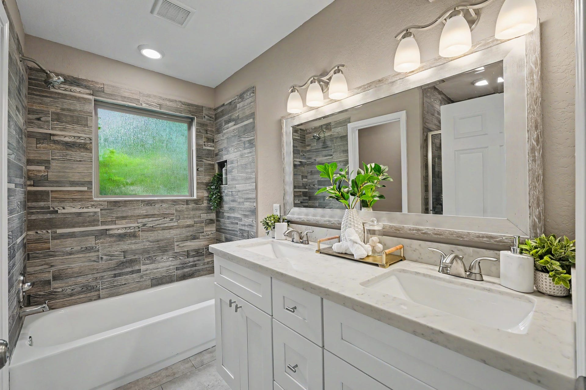 Don't let the tub/shower shown here fool you! There's also as separate walk-in shower in this primary bath.
