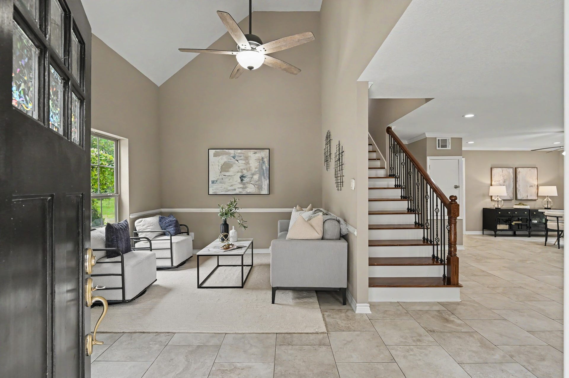 First of TWO living areas greets you upon entering.