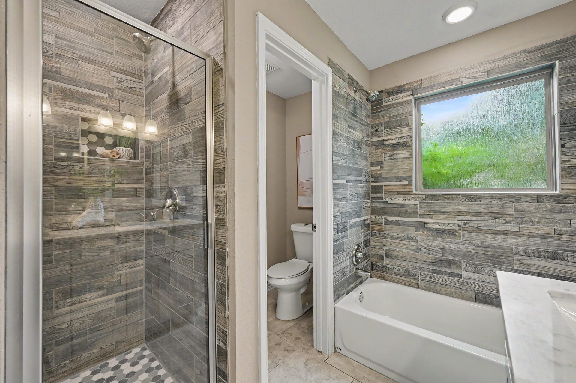 And here it is! Separate shower, private WC and the picture window with rain glass for privacy.