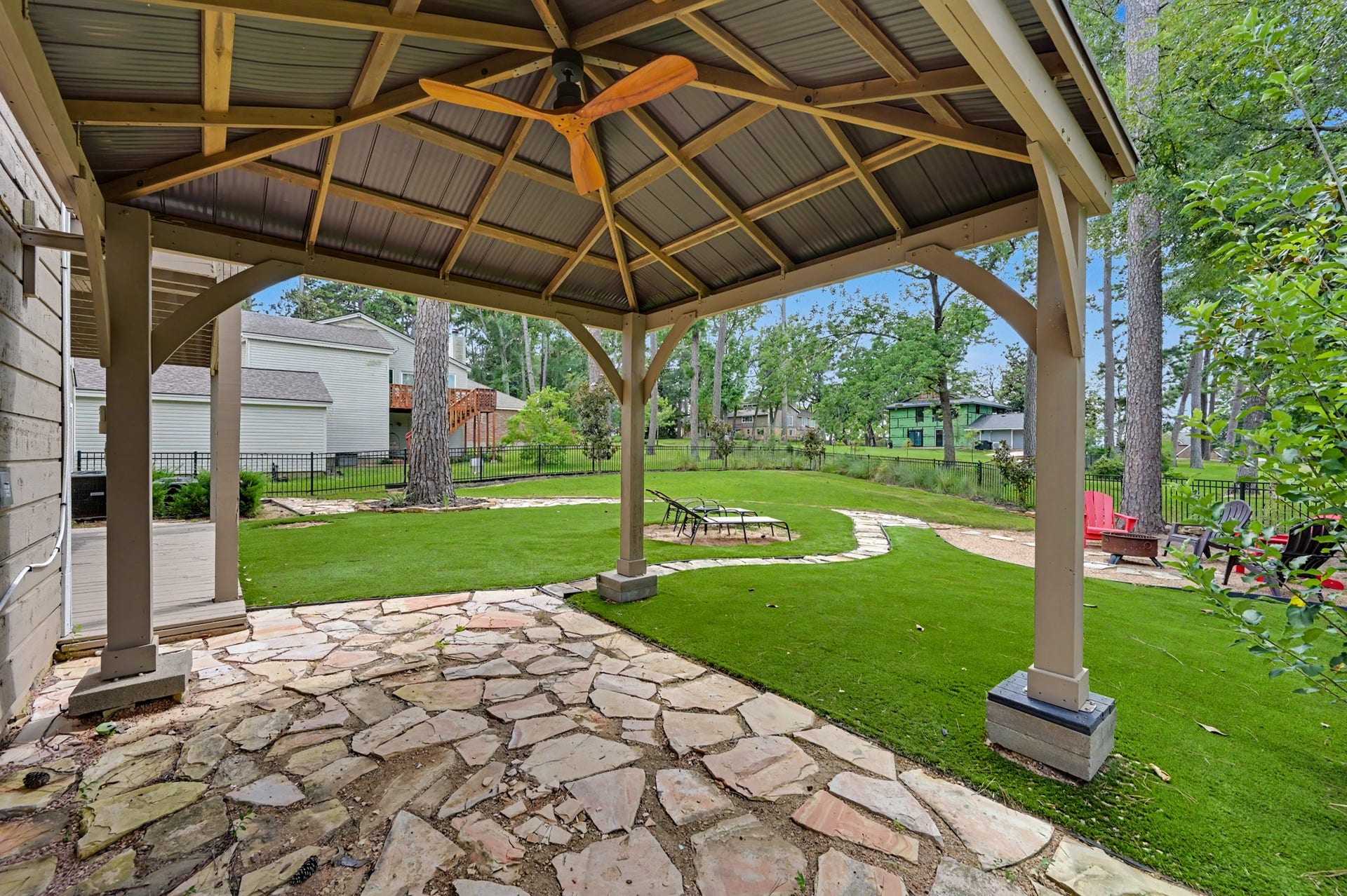 This gazebo is large enough to accommodate a full size outdoor dining table and chairs for alfresco dinners with friends and family.
