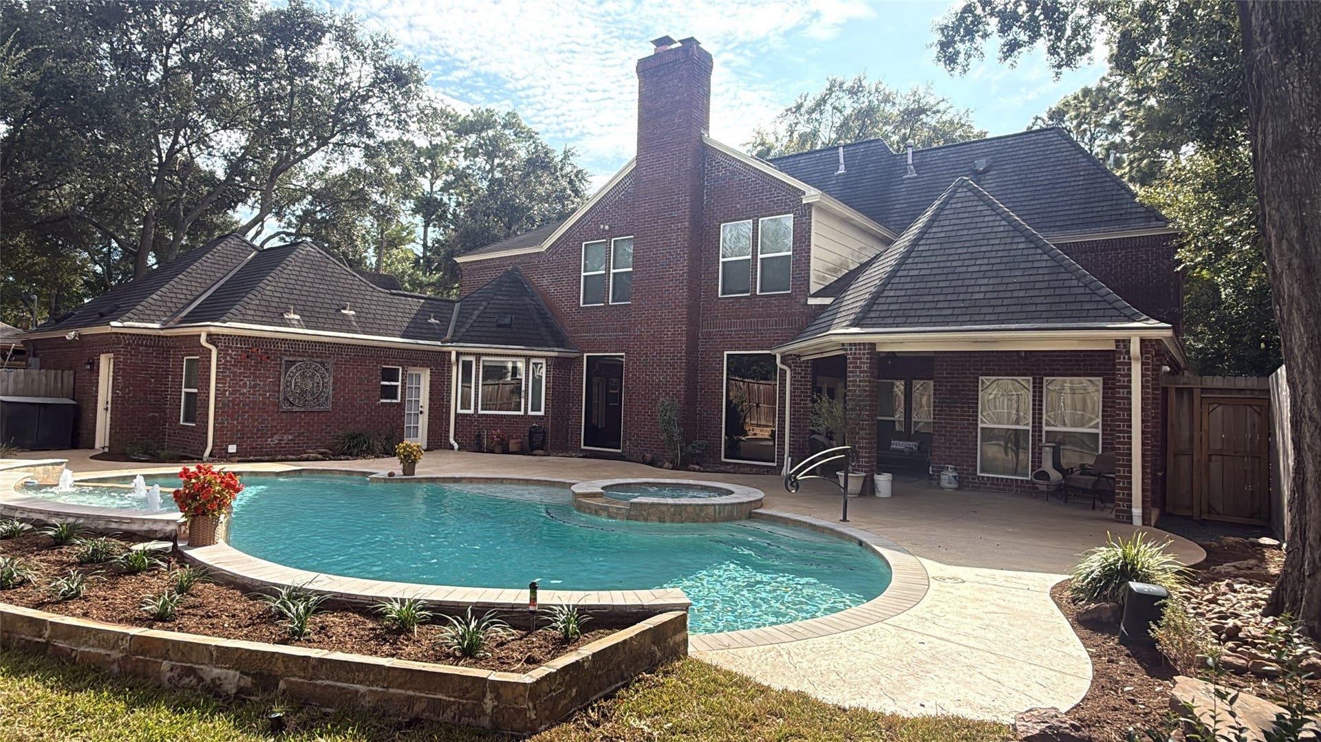 15914 Harwick Drive, Spring, TX 77379 SPARKLING REMODELED POOL AND COVERED PATIO - ALL BRICK HOME!