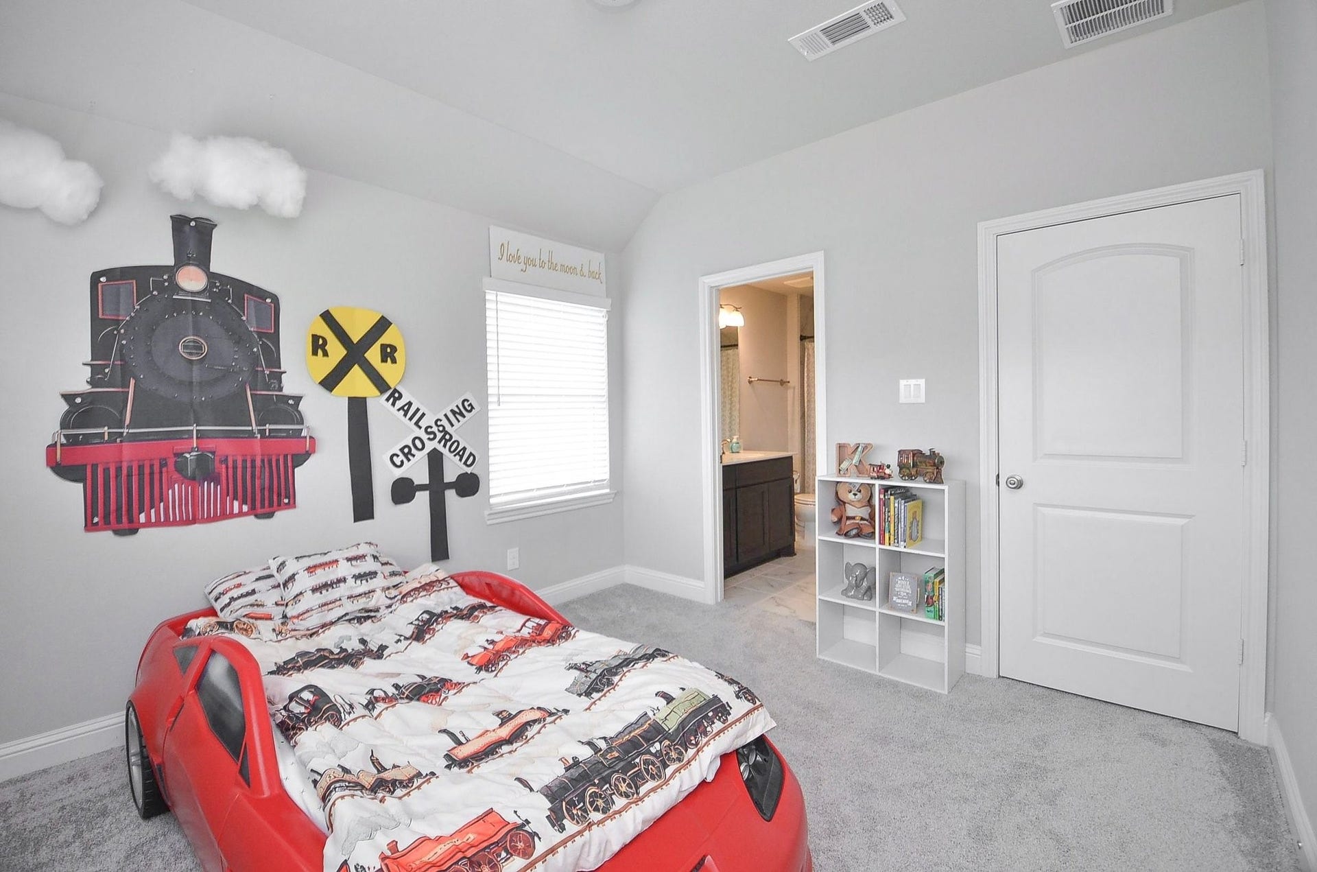 This secondary bathroom also offers a spacious walk-in closet and private en-suite bathroom.