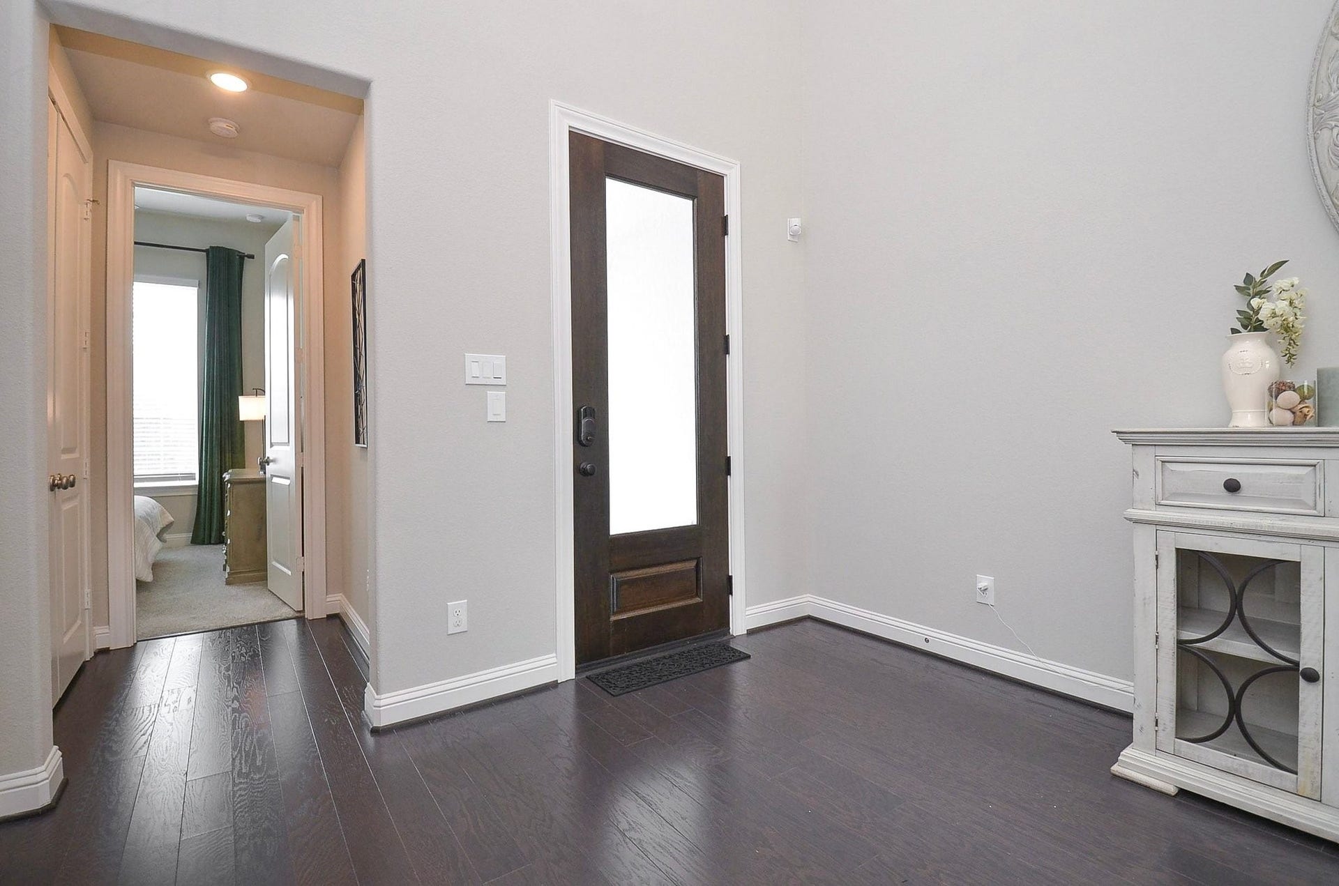 Further to your right, discover a spacious first-floor bedroom with a private en-suite bathroom, offering a comfortable retreat for overnight guests, multigenerational living, or an additional private home office.