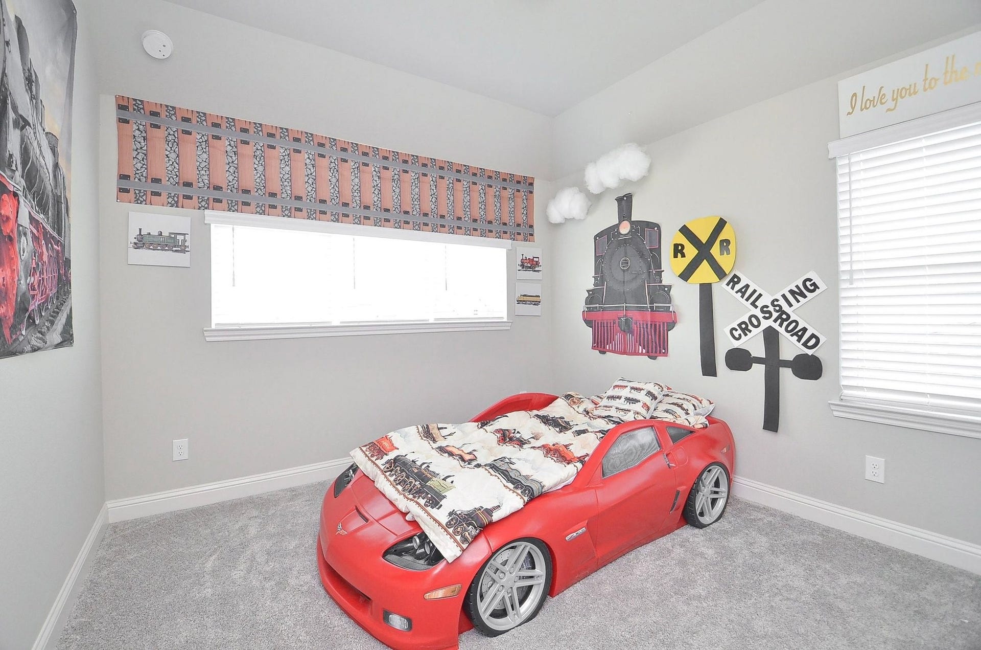 Your 11' x 11' secondary bedroom offers a bright and inviting space with soft carpeting, a ceiling fan, and natural light.
