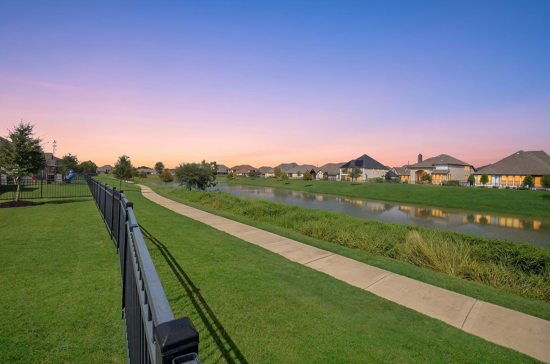 Picturesque lake views and scenic walking trail often visited by birds and ducks, create a peaceful waterfront backdrop to enjoy throughout the day.