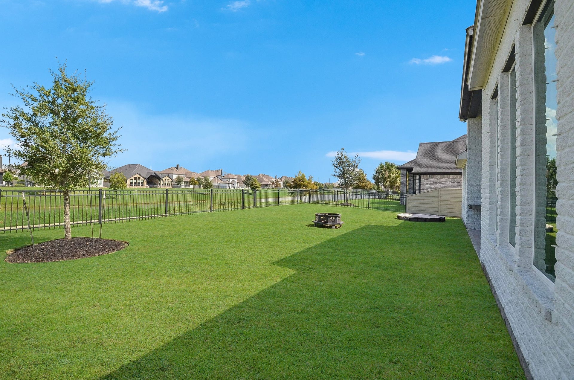 With lush green grass and plenty of open space, your expansive backyard offers a beautiful setting for outdoor play, family activities, and making lasting memories with loved ones.