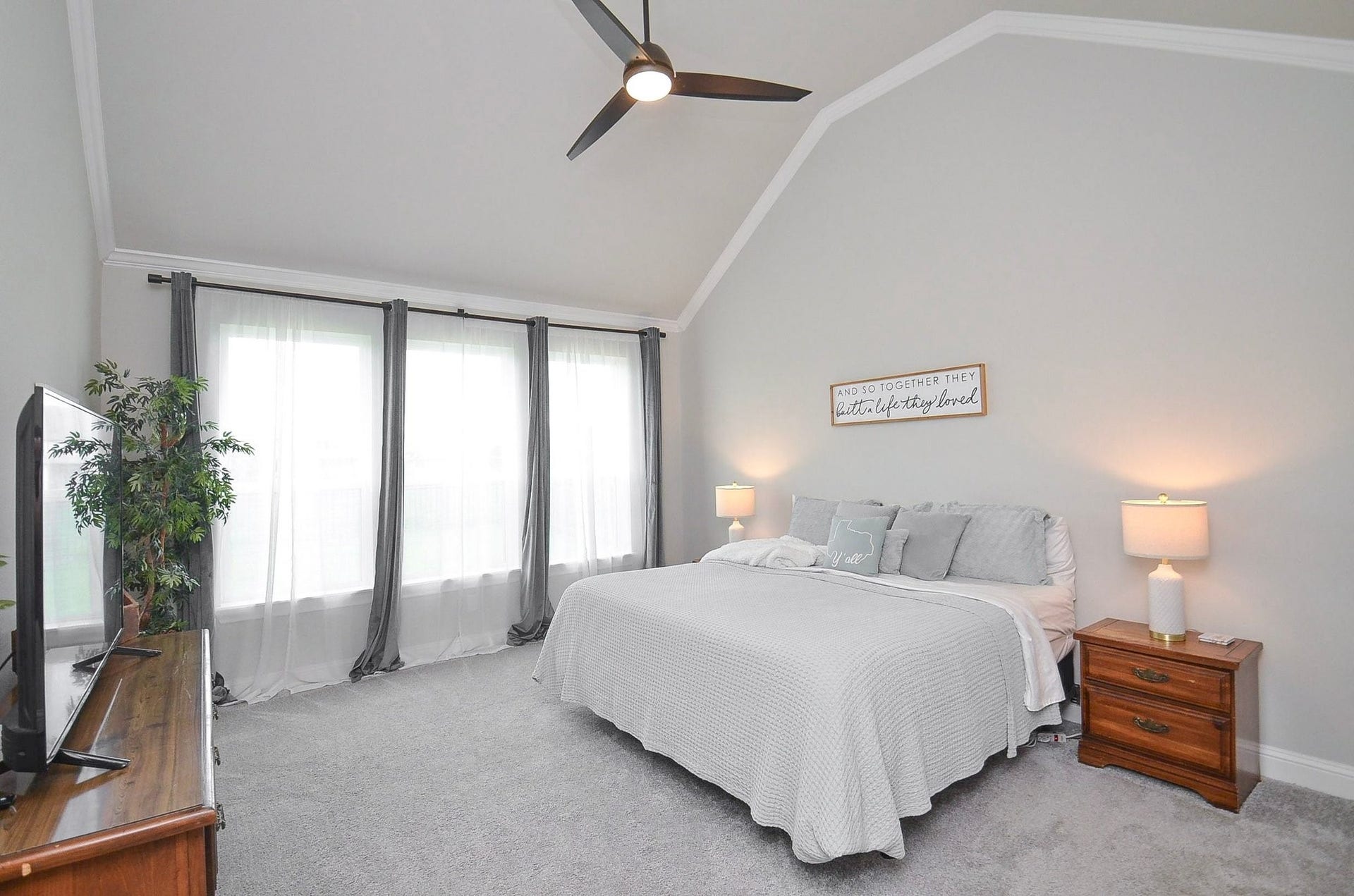 Retreat to your serene 15' x 16' first-floor primary bedroom, complete with large windows. A peaceful setting to unwind at the end of the day and wake up to beautiful views each morning.