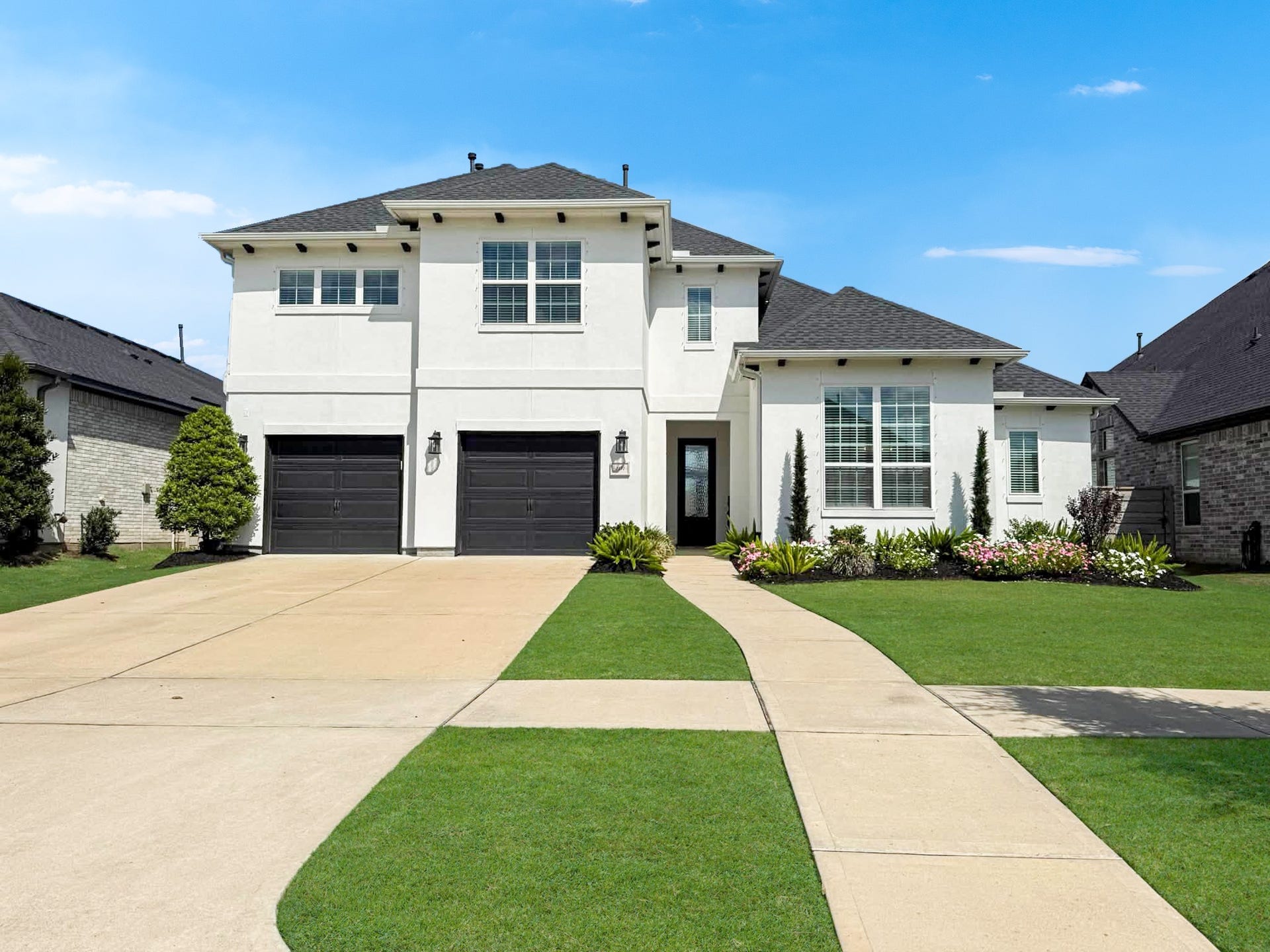 Welcome to 2131 Berry Trace Ct! Arrive home each day to luxurious stucco elevation home, meticulously landscaped front lawn, and covered entry that create a warm and inviting first impression.